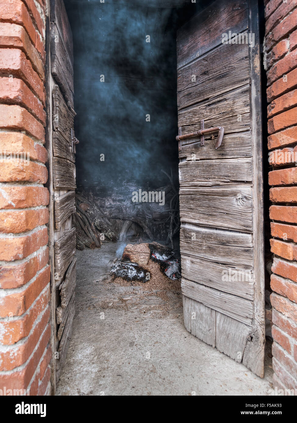 A glimpse into the drying house. Chestnut tree logs provide the heating