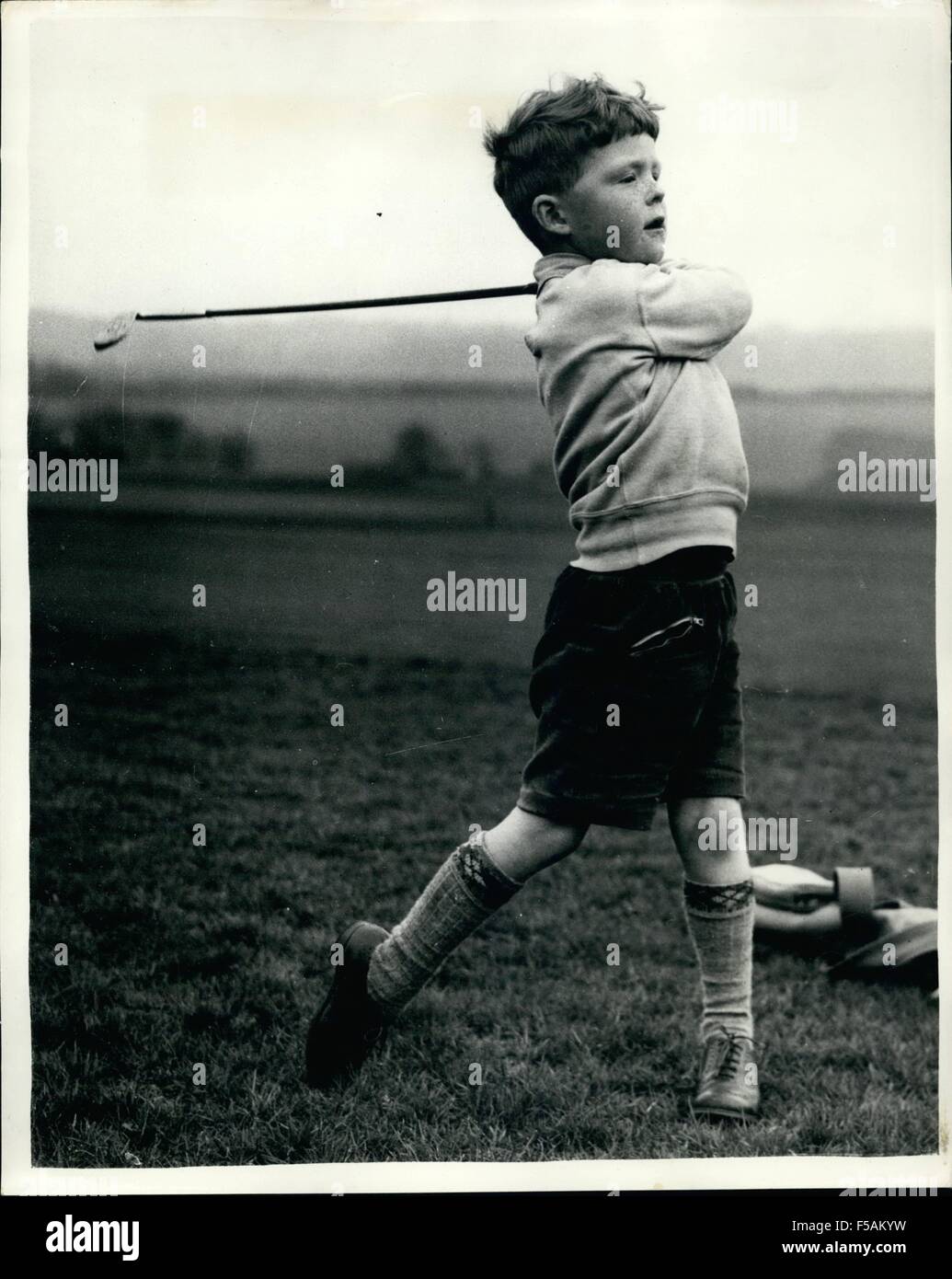 1968 - The Four-Year Old Golfer.: Although young Nicholas Job is only four and a half - he will playing in two golf competitions next month on successive days. His father, Mr. Len Job is the professional at Wrotham Heath Club, Kent, and has had small clubs and a miniature bag made for him. On April 22 he will play in the Neville Club's junior contest at Tunbridge Wells, and the following day he takes parts in a junior contest at Burhill Club, Walton on-thames. Photo shows with all the style of a professional golfer - young Nicholas Job is seen driving during a practise game at Wrotham Heah Clu Stock Photo