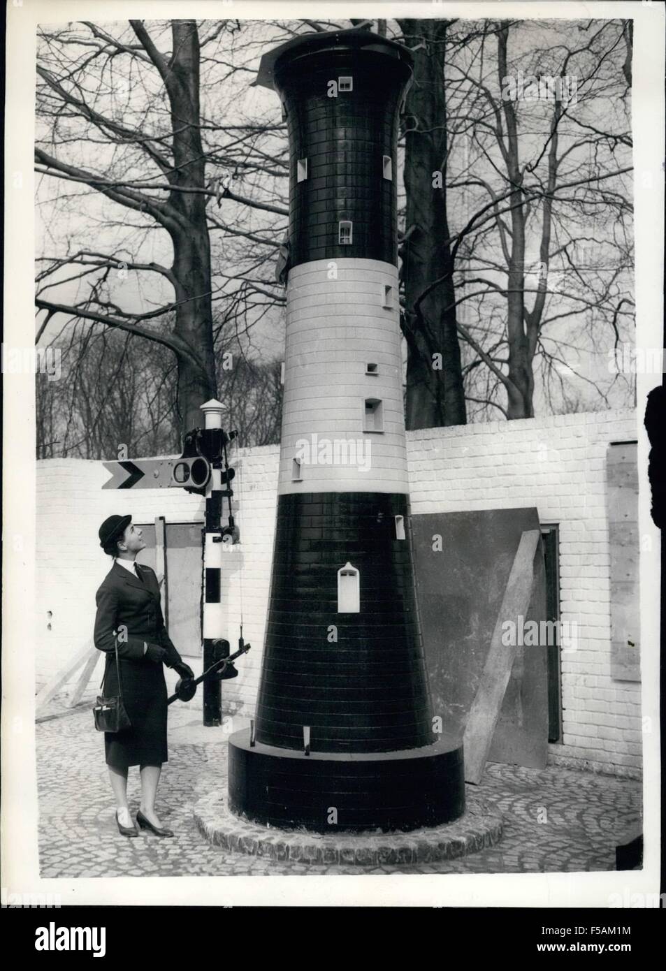 1968 - Belgium Prepares For The International Fair. Lighthouse Model In British Pavilion. Preparations are well ahead for the opening in Brussels - of the great International Fair. Keystone Photo Shows:- In the ''Courtyard of Invention'' of the Great Britain Pavilion - planned by the Royal College - Nineteen year old Miss Vee van Parys of Antwerp looks at a model of a lighthouse - at the exhibition. Miss Van Parys wears the official uniform of a exhibition Hostess. © Keystone Pictures USA/ZUMAPRESS.com/Alamy Live News Stock Photo