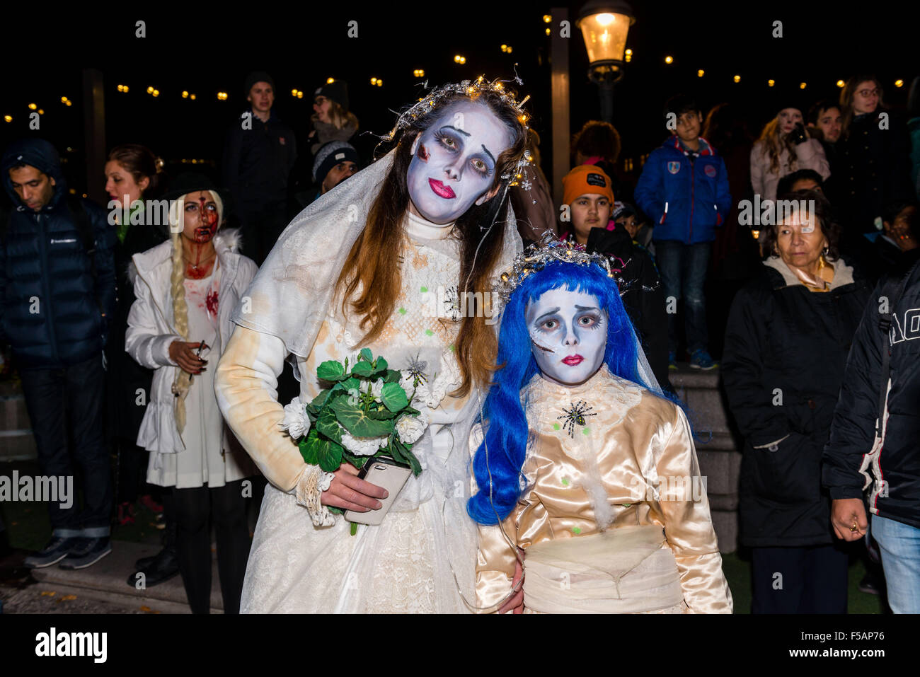 Stockholm, Sweden. 31st Oct, 2015. People attend a Halloween parade in