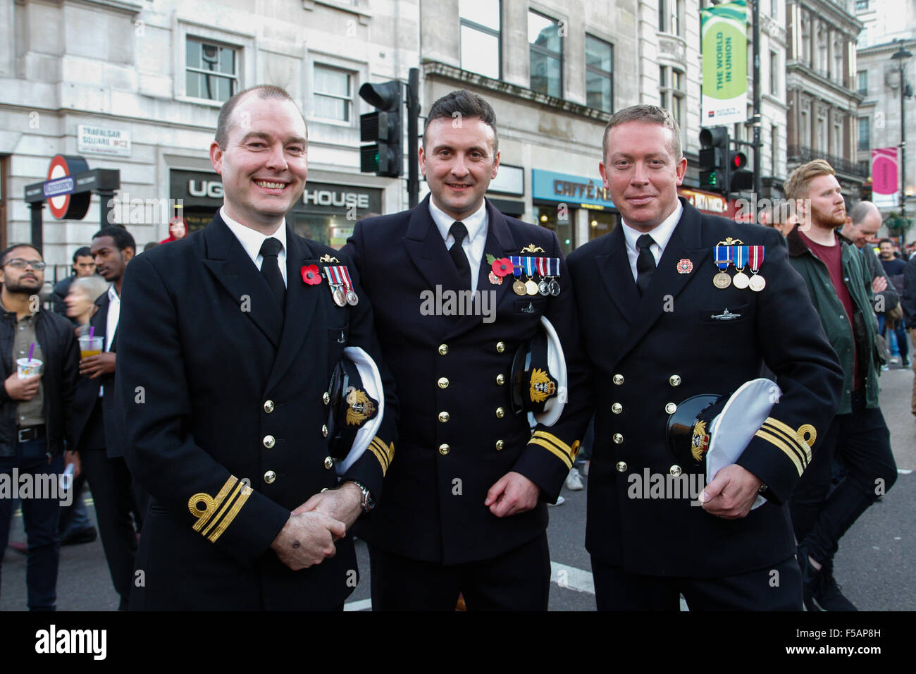 London, UK. 31st October 2015. Flag Officers Sea Training North enjoying the Rugby World Cup final match between New Zealand and Australia match shown on the big screen at the Trafalgar Square Fanzone. Credit: Elsie Kibue / Alamy Live News Stock Photo