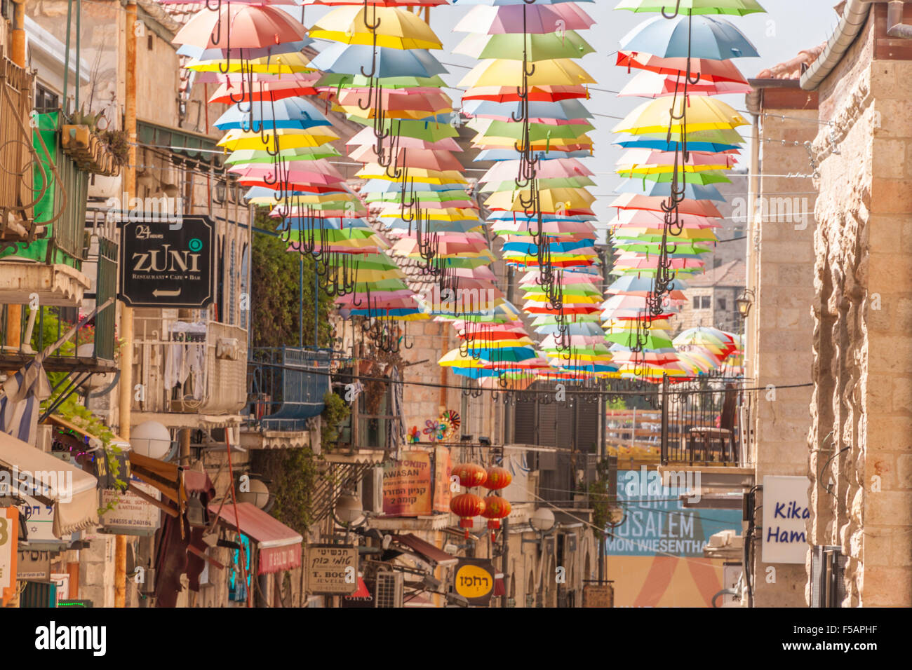 Israel. Shop signs at the umbrellacovered "Nachalat Shiv'ah" street in