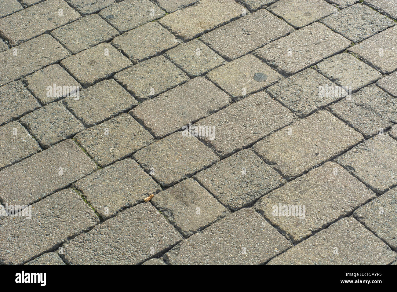 Cobbled road surface in Truro, Cornwall. For high street decline, footfall decline. Abstract data, data collection abstract, cobble texture. Stock Photo