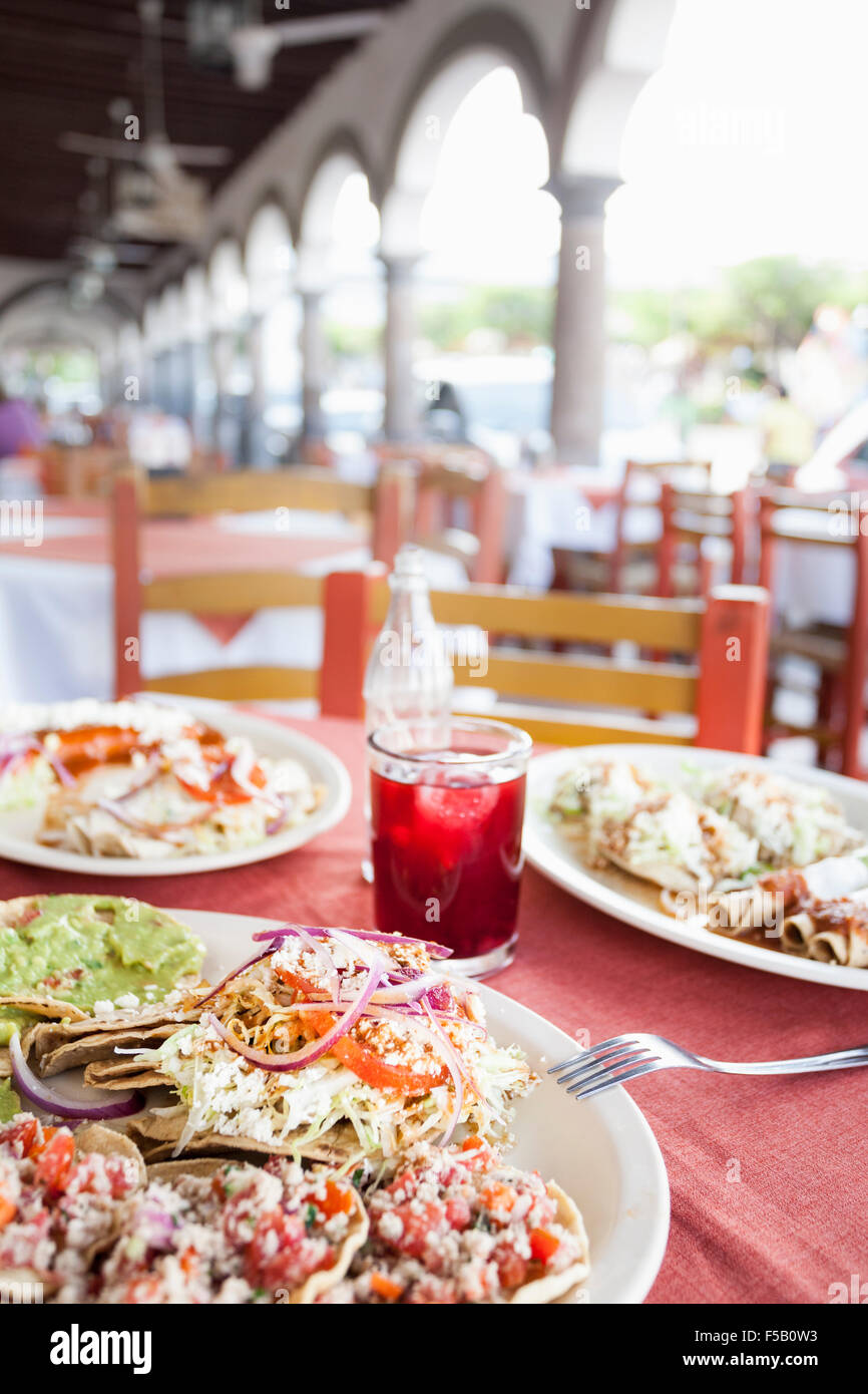 Tostadas and tacos dorados at Don Comalon restaurant near the plaza of Comala, Colima, Mexico. Stock Photo