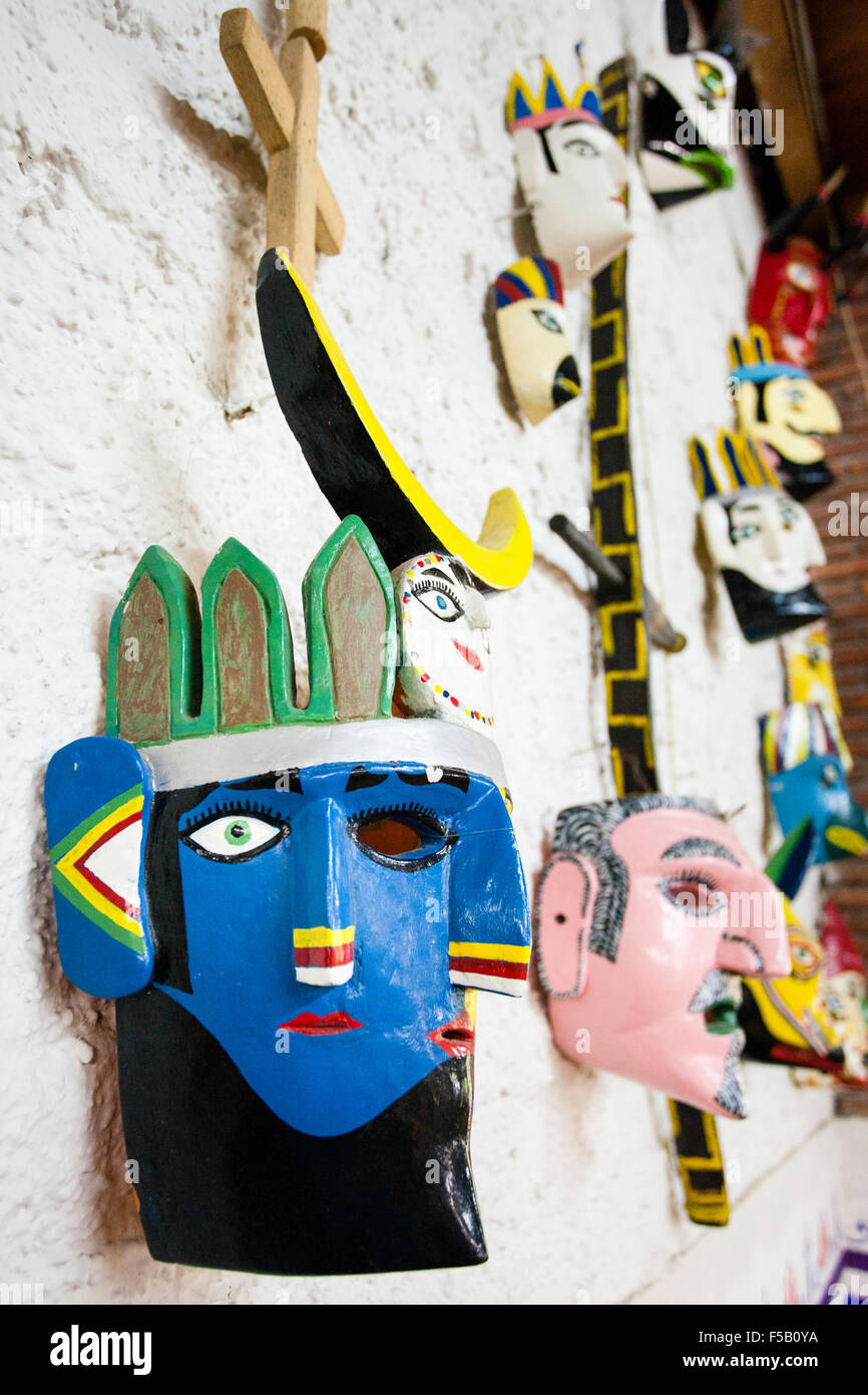 Painted masks on display in a Suchitlan, Colima market in Mexico. Stock Photo