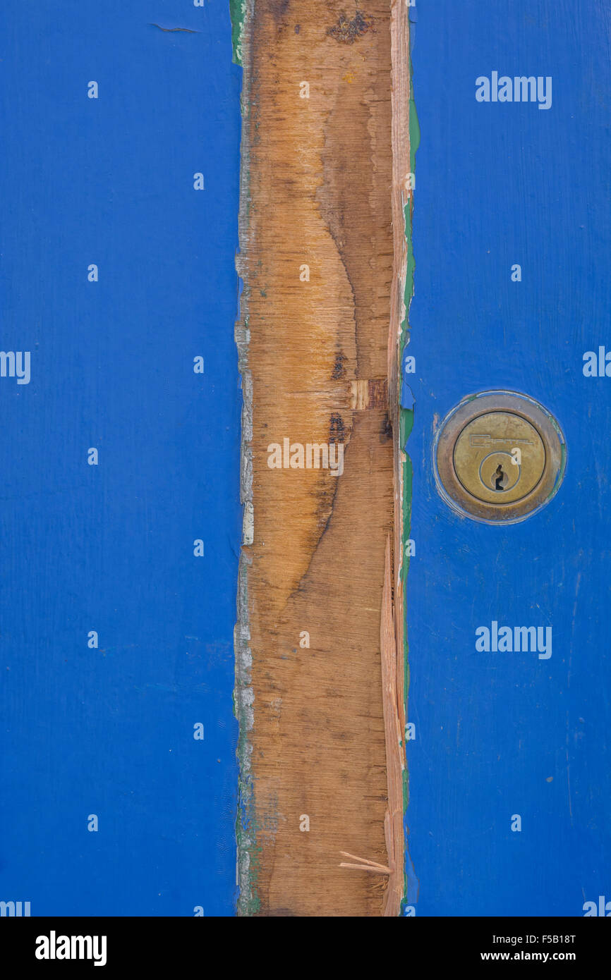 Access denied, denial of access, email blocked, barrier concept. Painted blue doorway entrance with old lock. Stock Photo