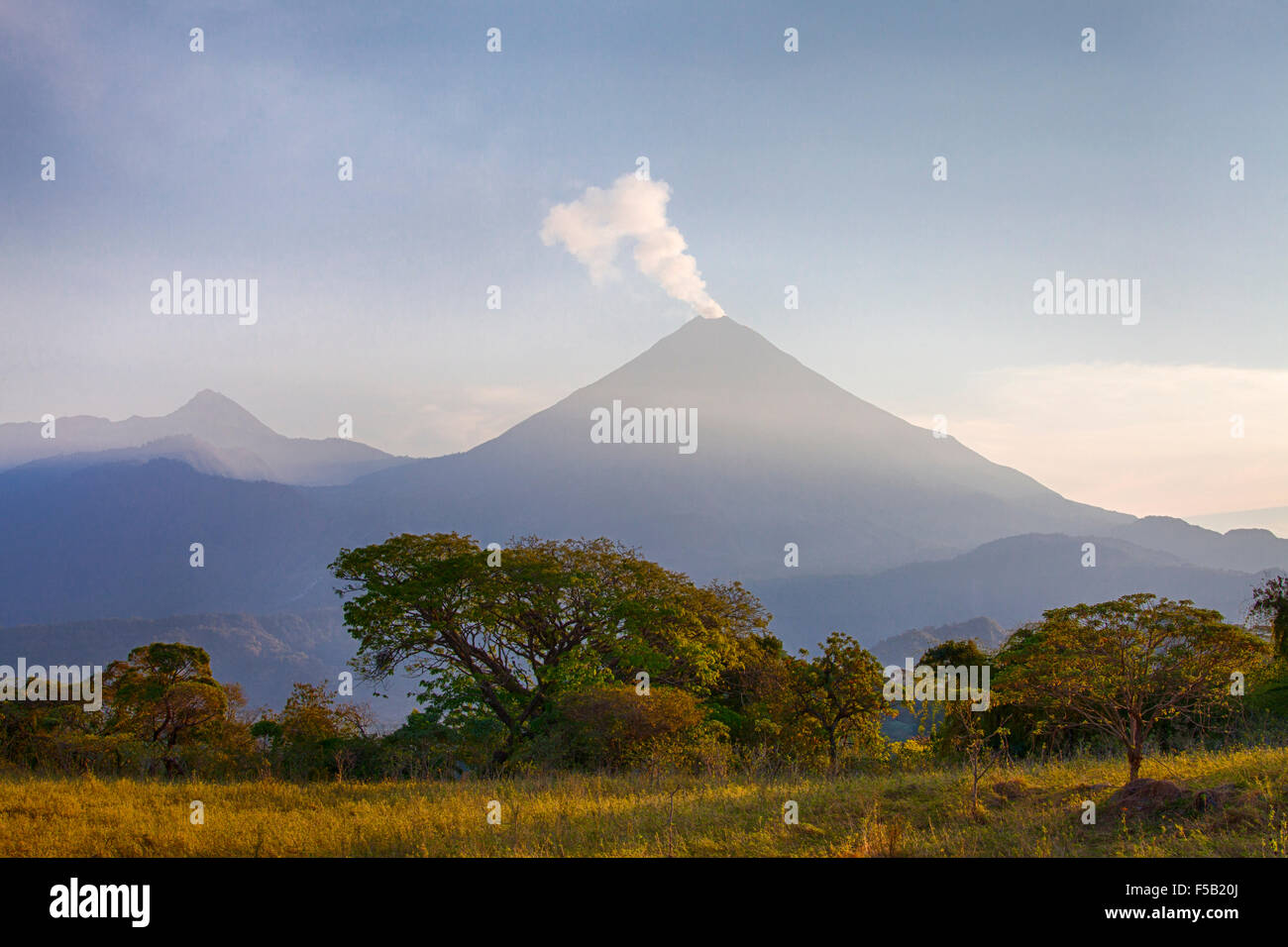 The 'Volcan de Fuego' at sunrise in Colima, Mexico. Stock Photo