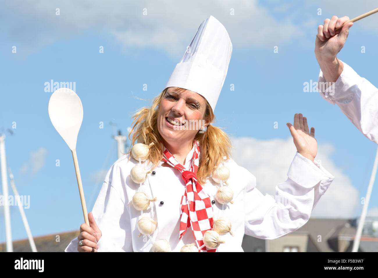 Stilt walker dressed as a chef in Sutton Harbour at Plymouth Food