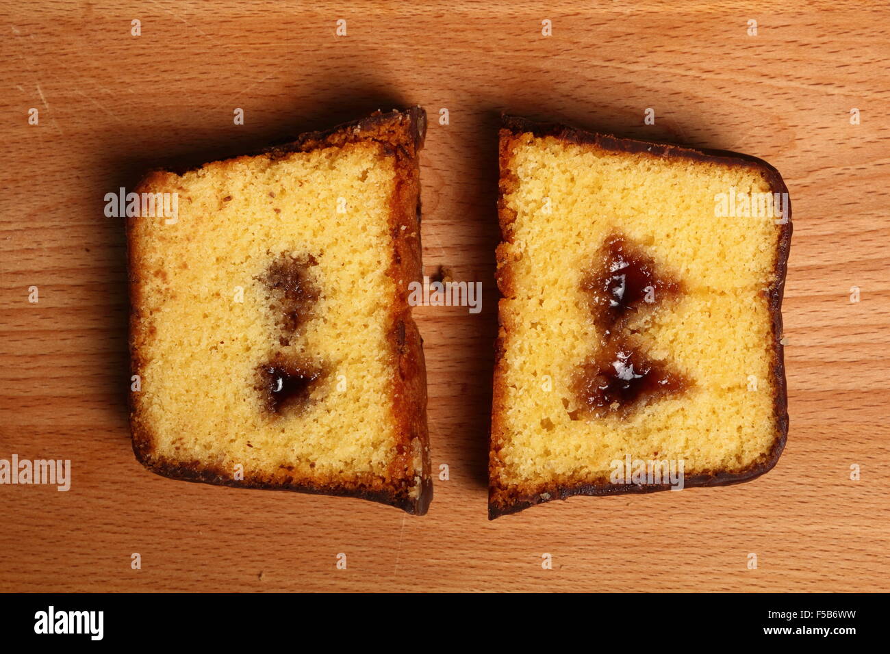 Chocolate glazed loaf cake with strawberry jam Stock Photo Alamy