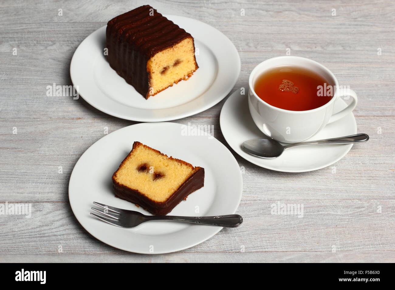 Chocolate glazed loaf cake with strawberry jam Stock Photo Alamy