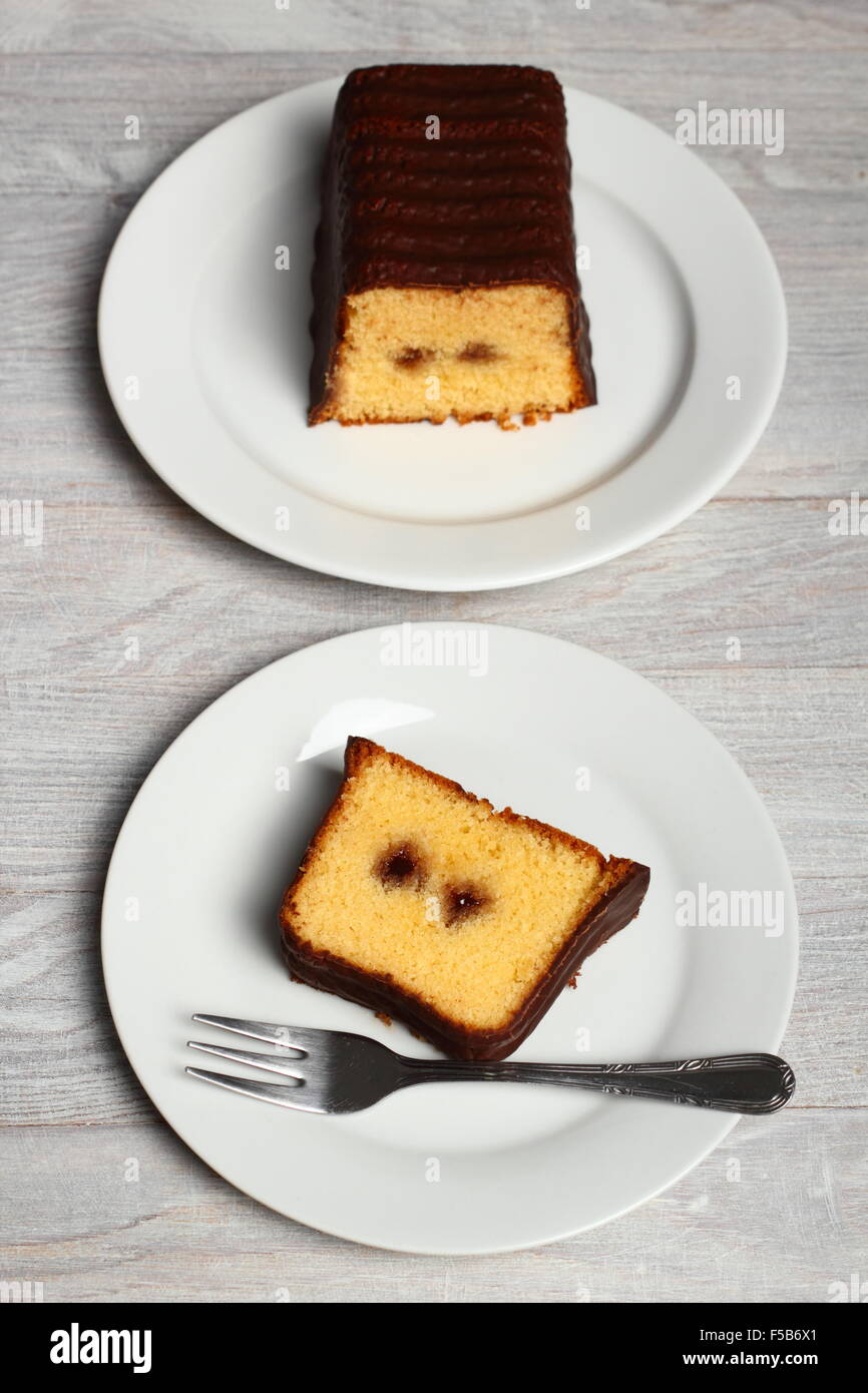 Chocolate glazed loaf cake with strawberry jam Stock Photo Alamy