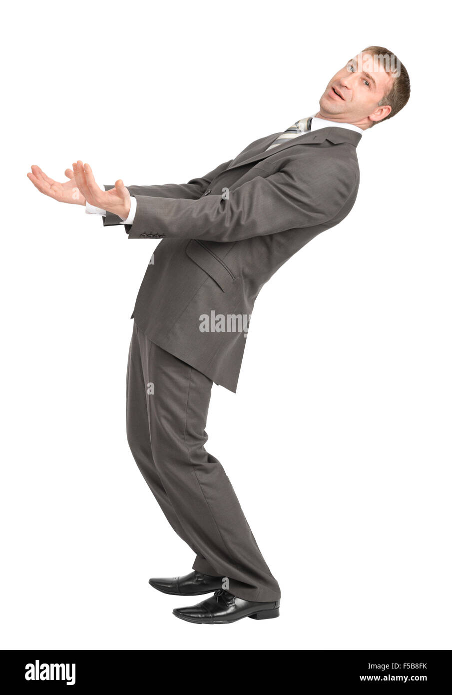 Businessman leaned back with empty hands on white Stock Photo