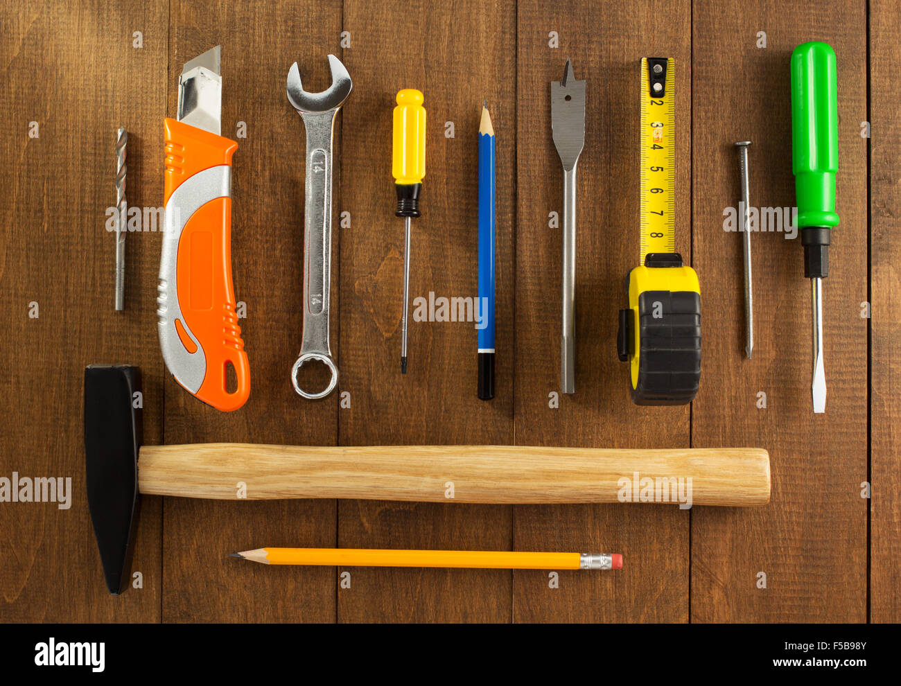 set of tools and instruments on wooden background Stock Photo - Alamy