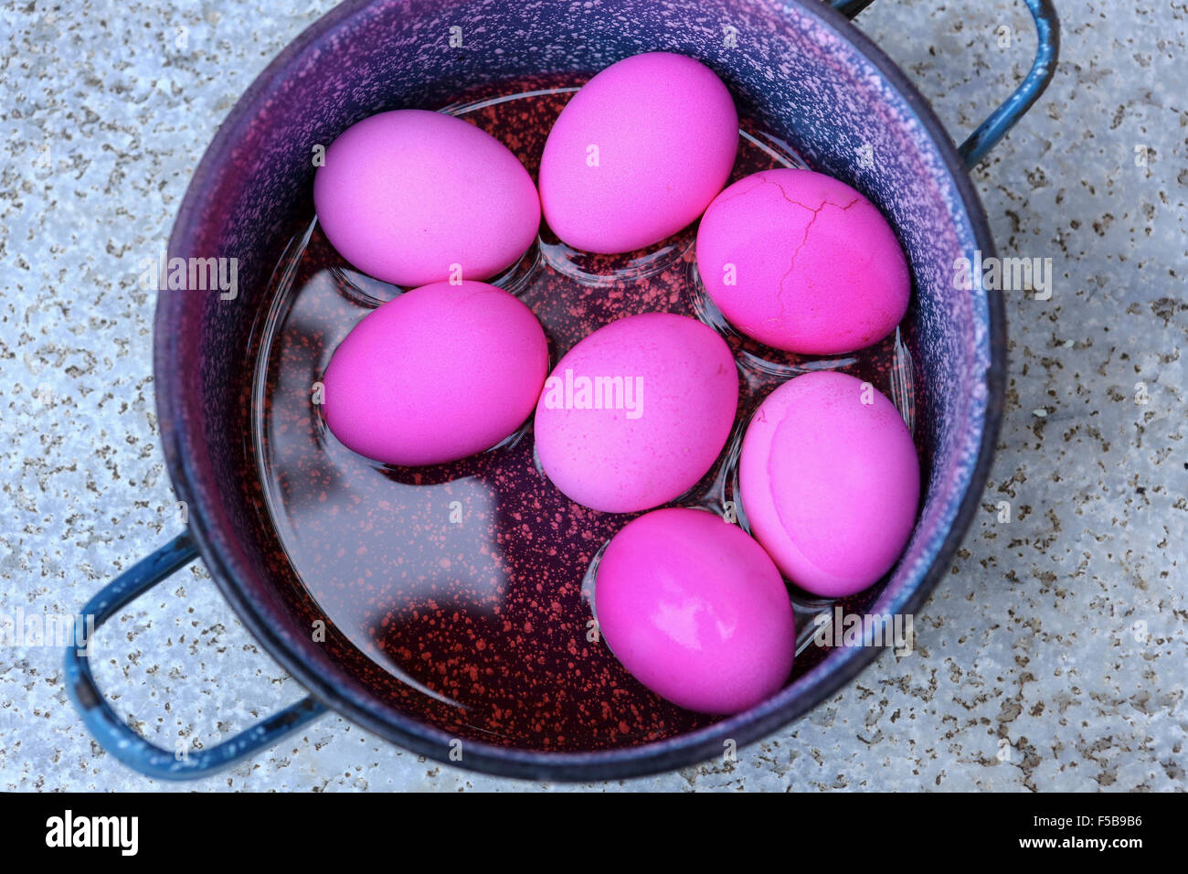 red hard boiled eggs (dyed with beetroot) a good start for Easter eggs (dyed with beetroot) This image has a restriction for lic Stock Photo