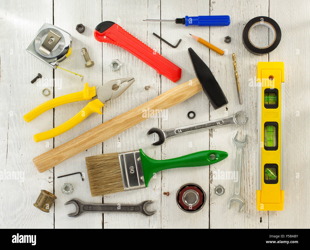 set of tools and instruments on wooden background Stock Photo - Alamy