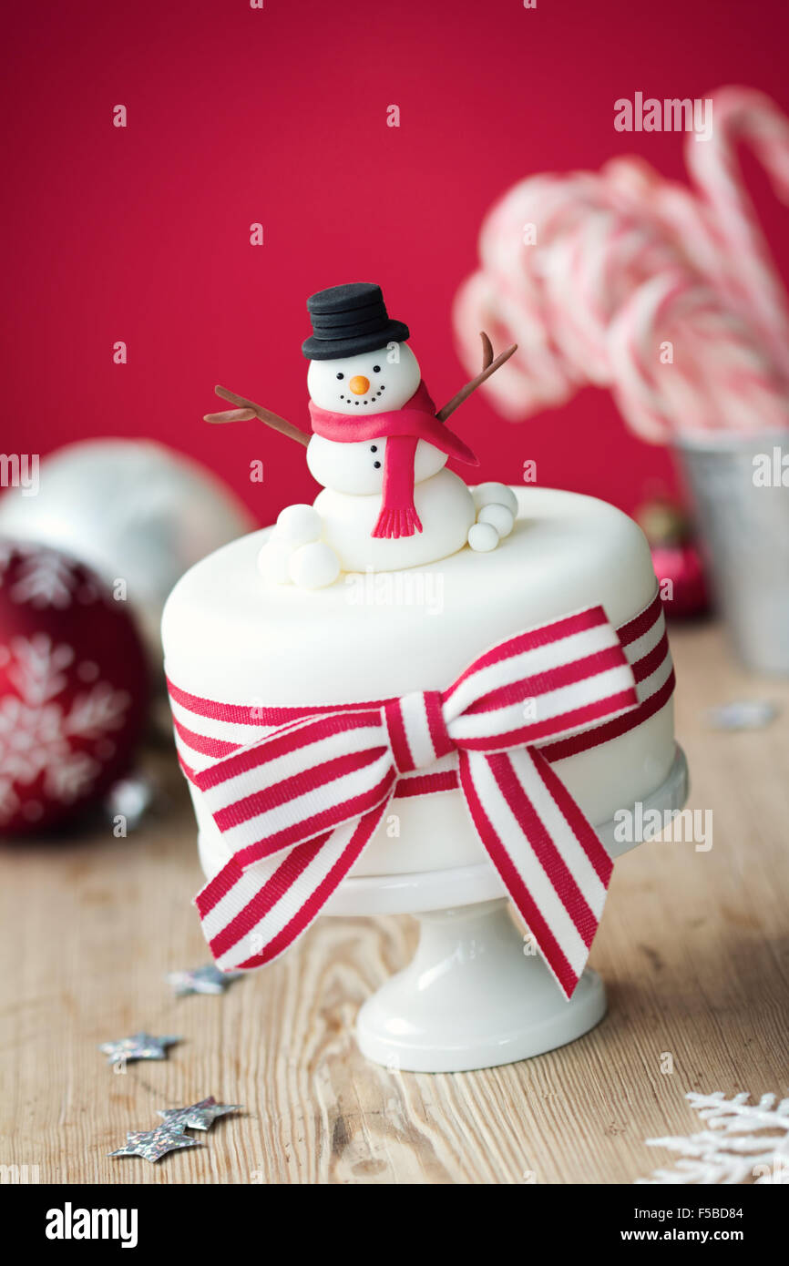 Christmas Cake Decorated With Fondant Snowman Stock Photo