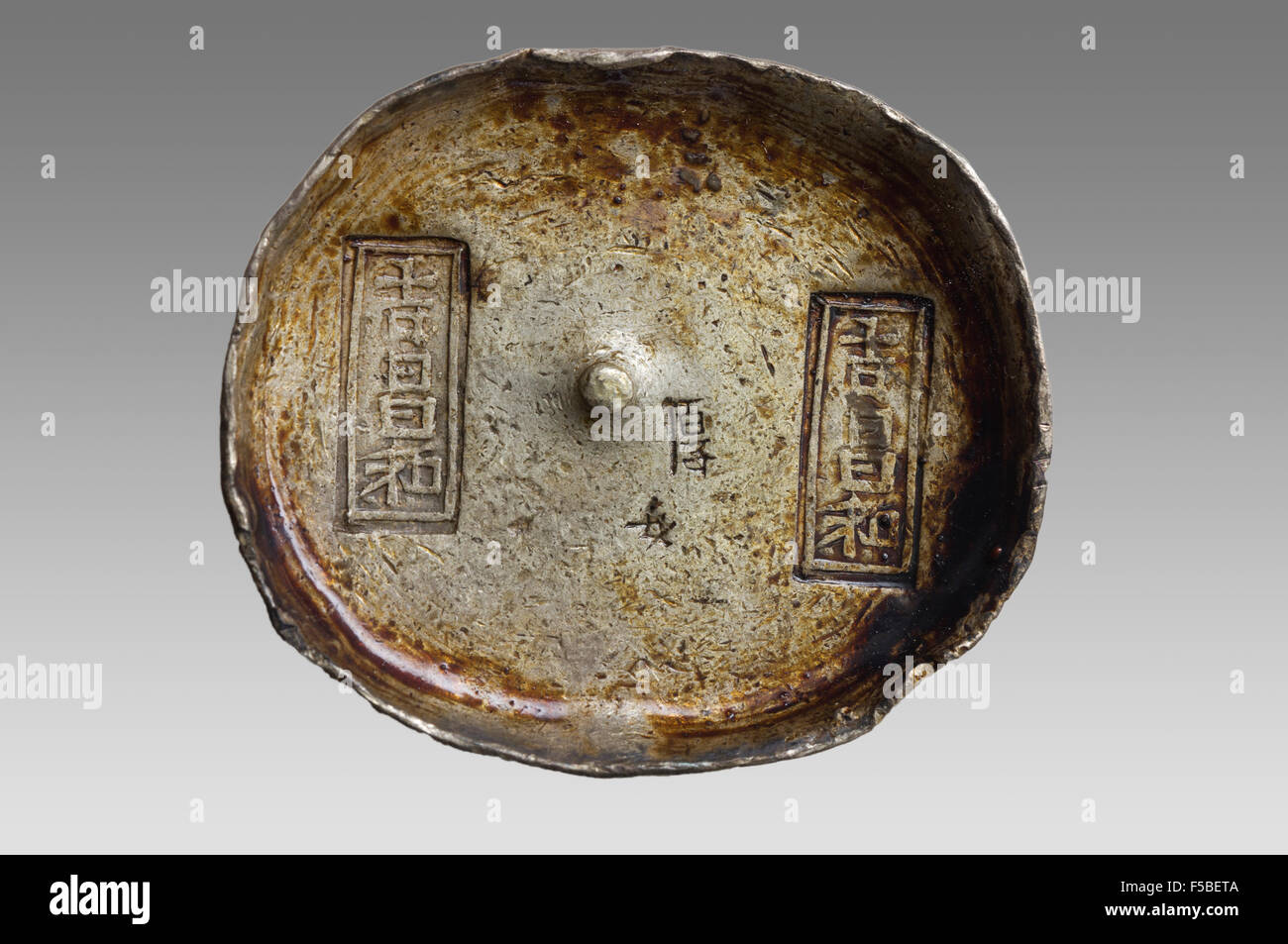 Old chinese silver ingot of Qing Dynasty Stock Photo - Alamy