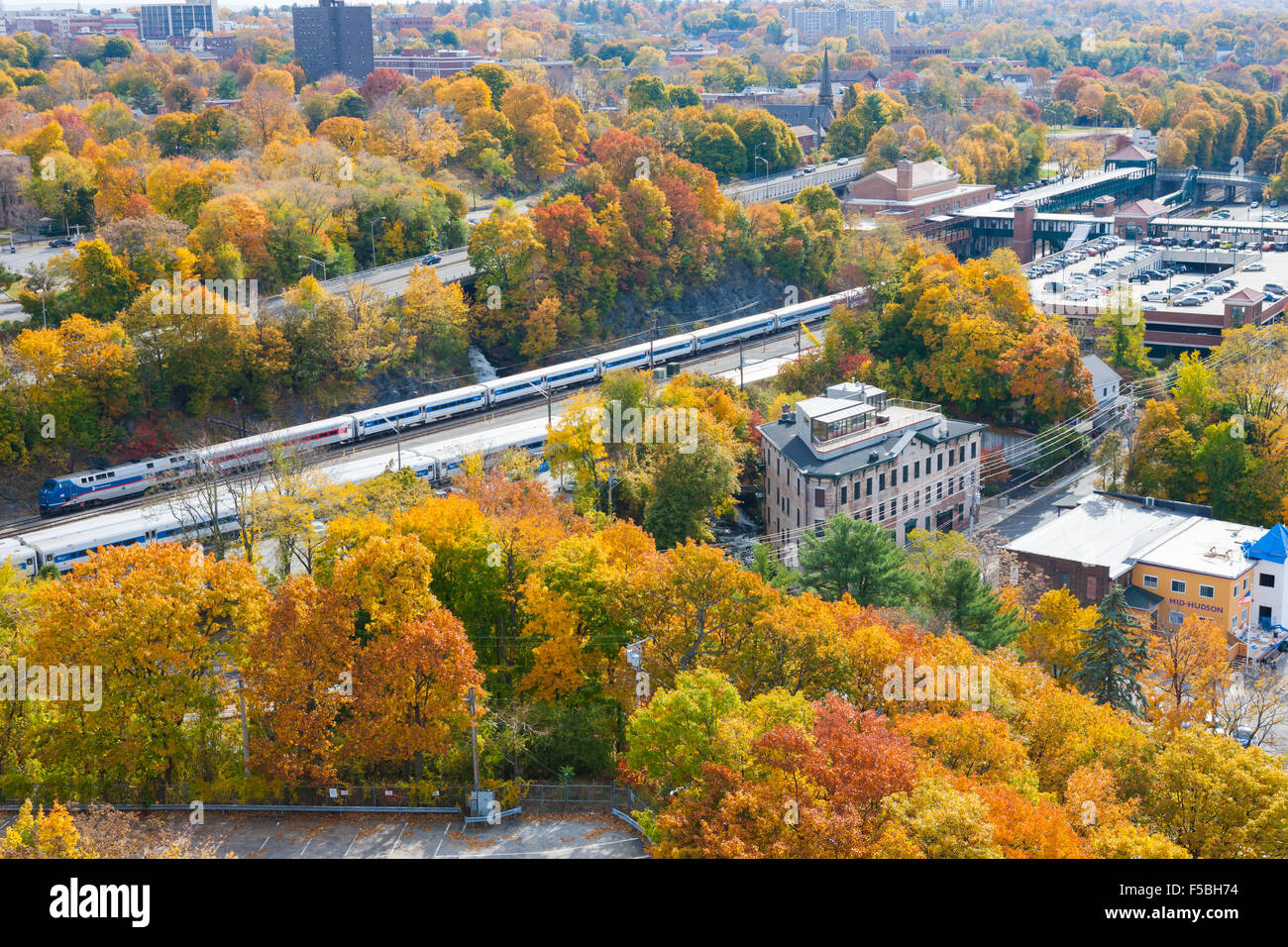 Aerial view from the Walkway over the Hudson of Metro-North Hudson Line and fall foliage in Poughkeepsie, New York Stock Photo