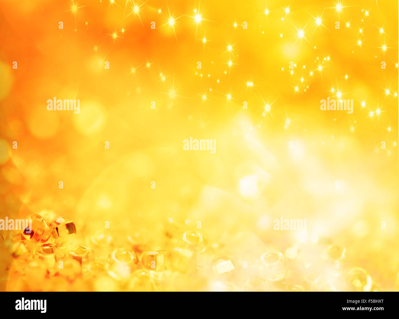 Abstract holiday gold background with stars shapes and lights rounds Stock Photo