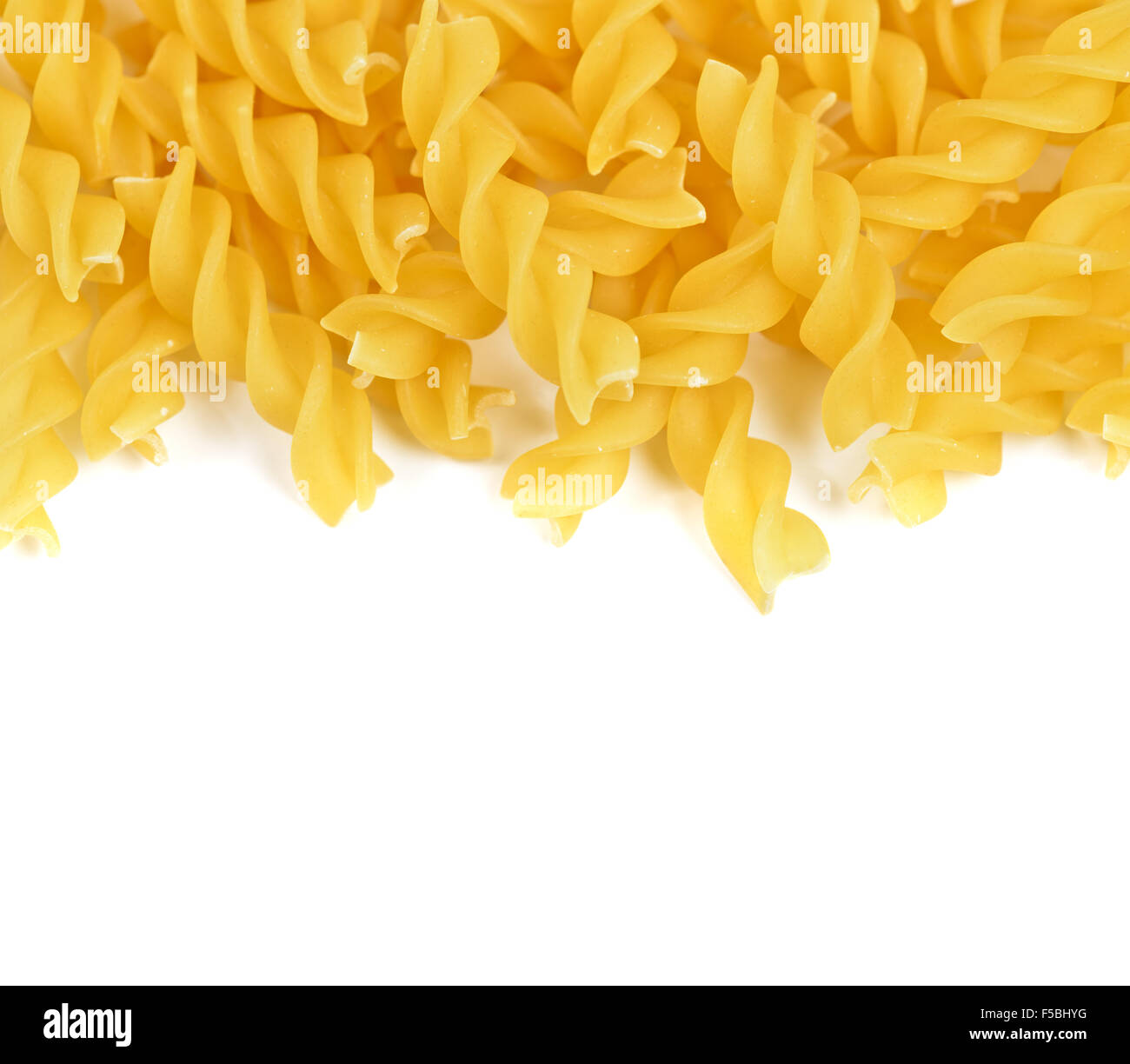 Rotini pasta top view macro on white background Stock Photo Alamy