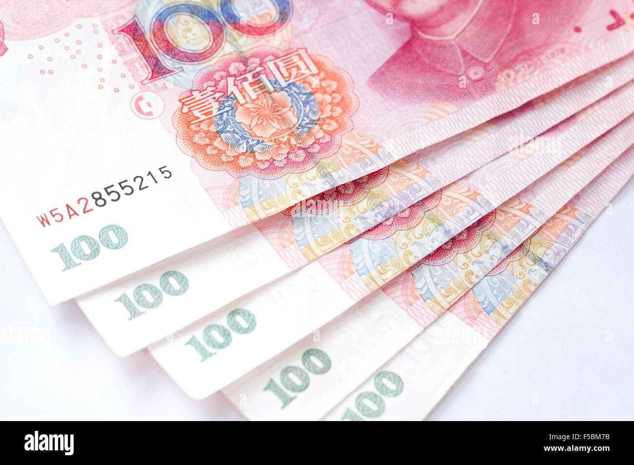 Macro-shot for Renminbi (RMB) , 100 hundred dollar. Mao's eyes gaze at the number '100'. Stock Photo