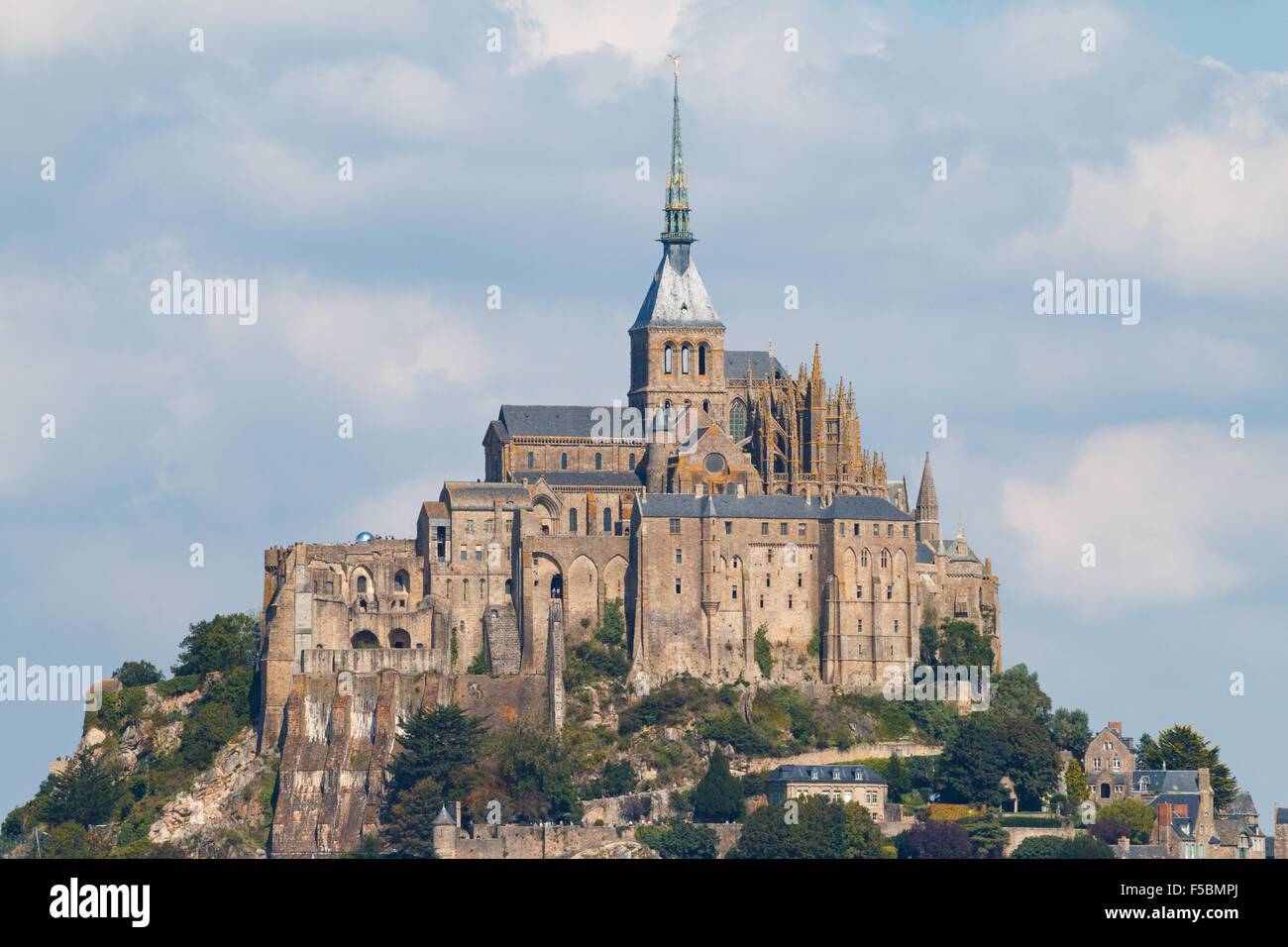 The monastery of Le Mont Saint-Michel in the late summer sun. Approximately 9000 tourists a day visit the famous island. Stock Photo