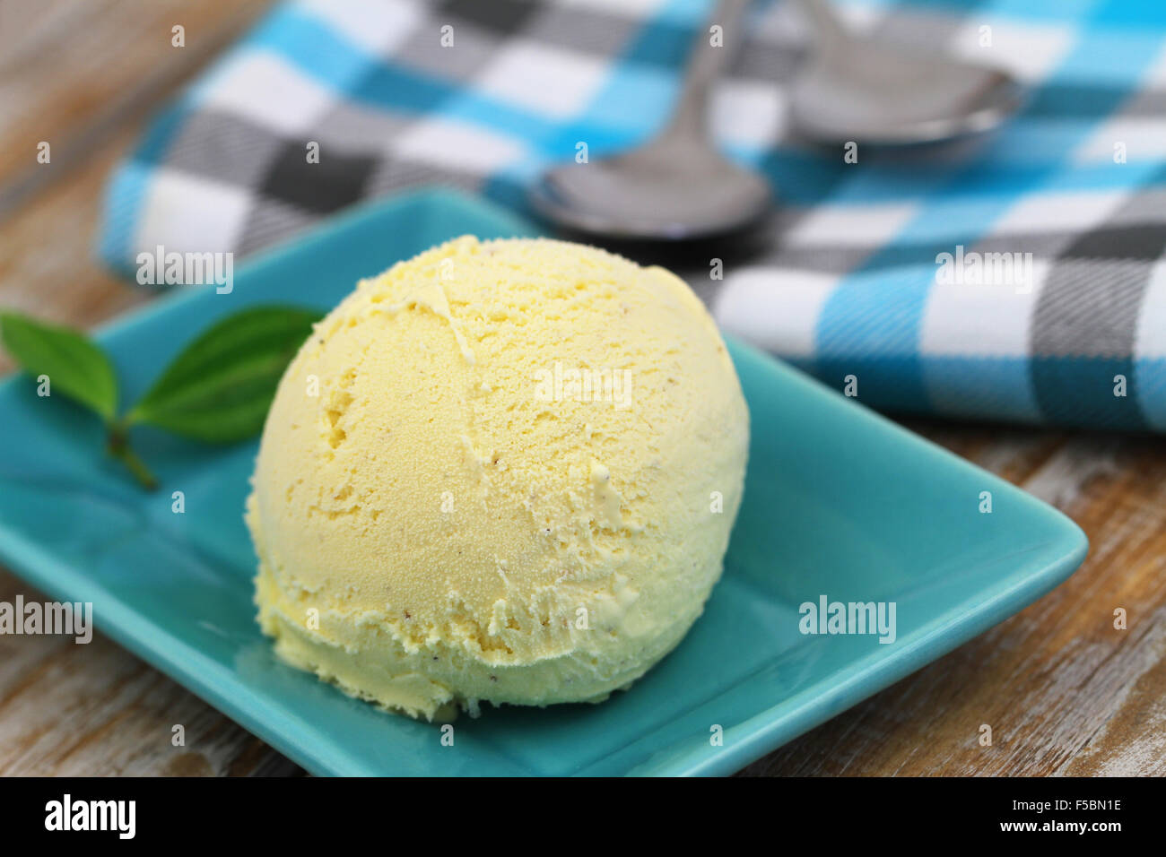 Scoop of vanilla ice cream, closeup Stock Photo