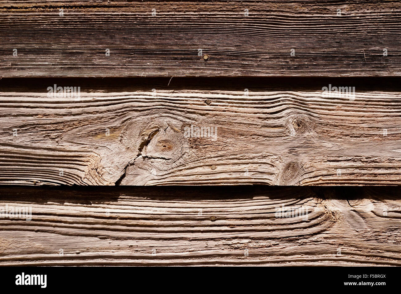 Abstract weathered wood on building in Key West FL USA Could be used as background, good copy space Some with louvered windows. Stock Photo