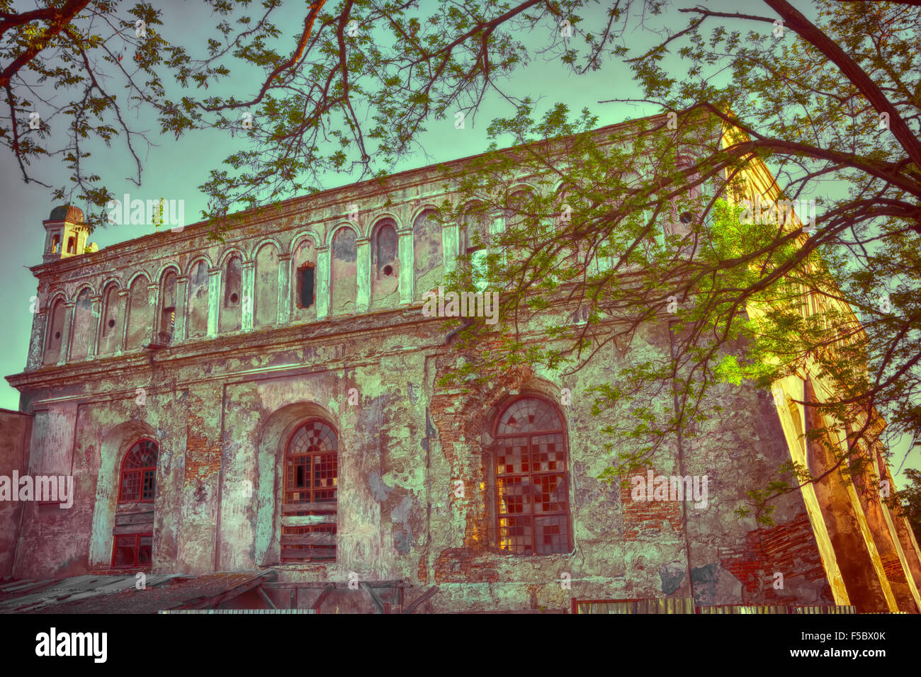 Synagogue in Zhovkva Lviv region founded in 1692-1698. March 2015. Vintage soft effect, warm toning Stock Photo