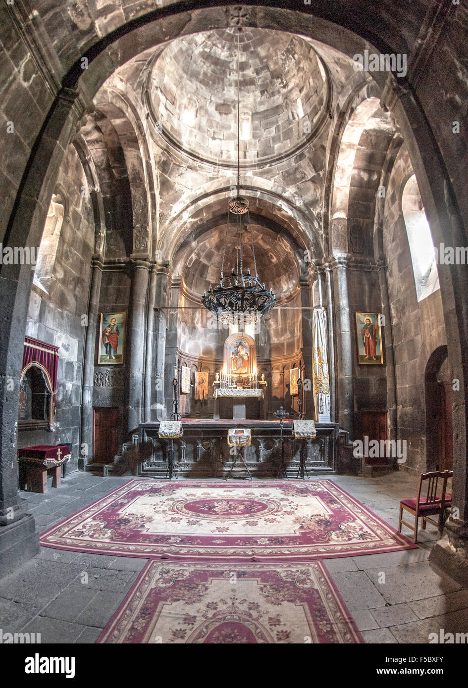 Interior of Geghard monastery in Armenia. Stock Photo