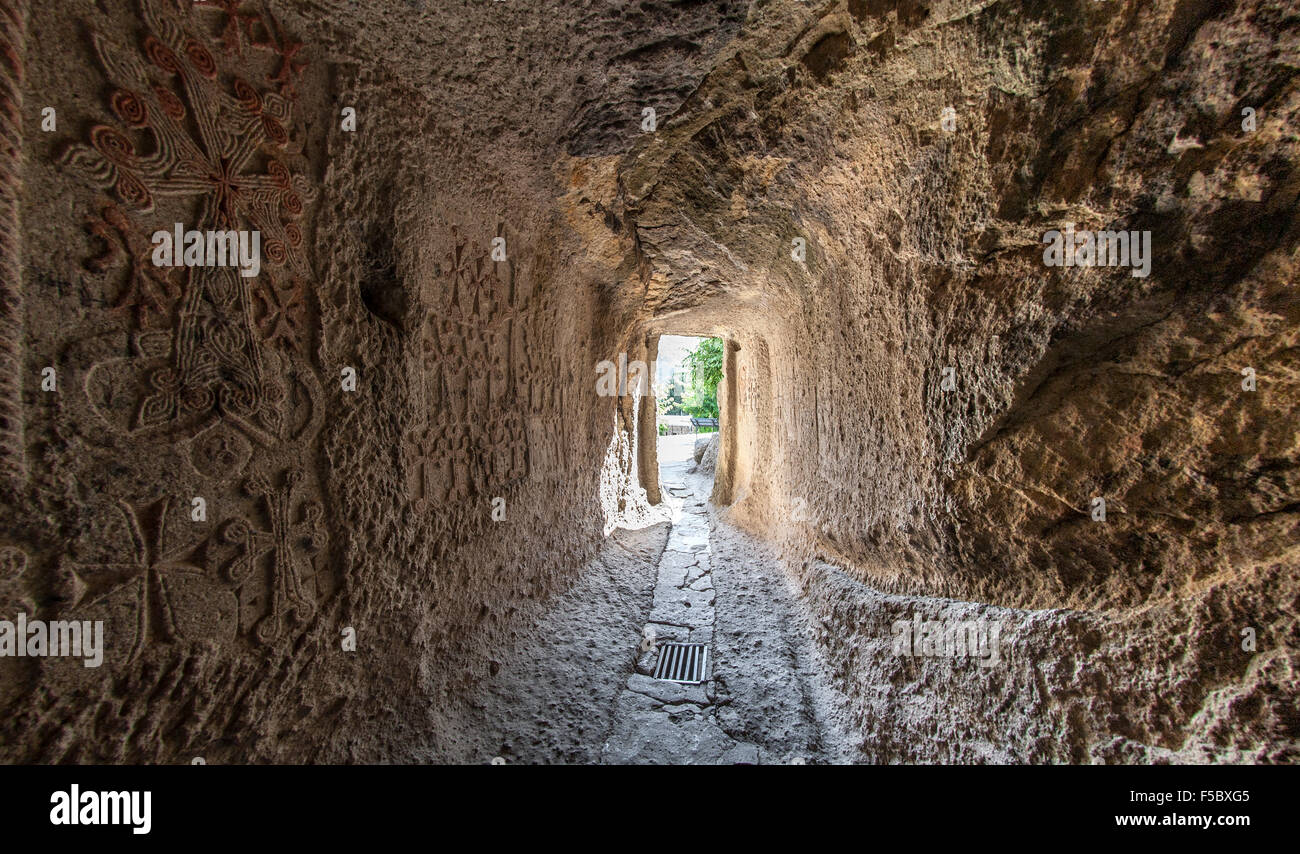 Stone passageway leading to the upper gavit of Geghard monastery in Armenia. Stock Photo