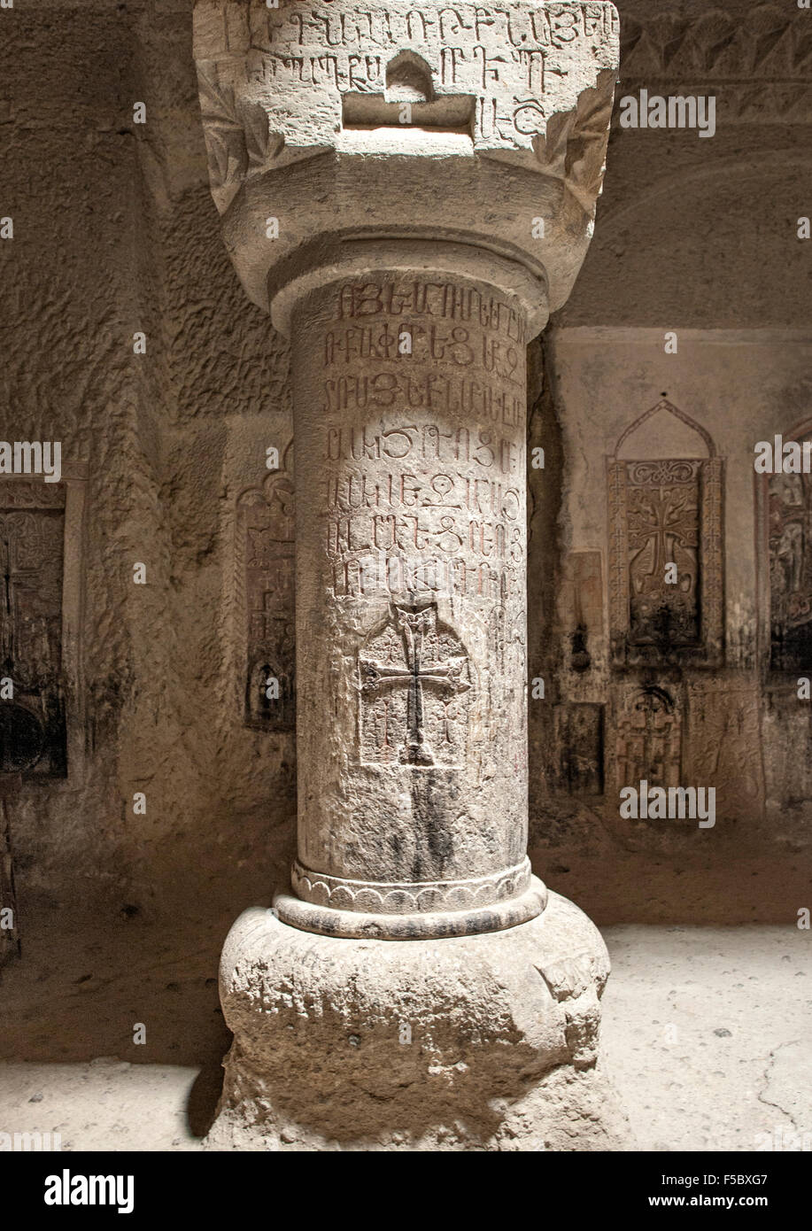 Stone column with carvings in the gavit of the Geghard monastery in Armenia. Stock Photo