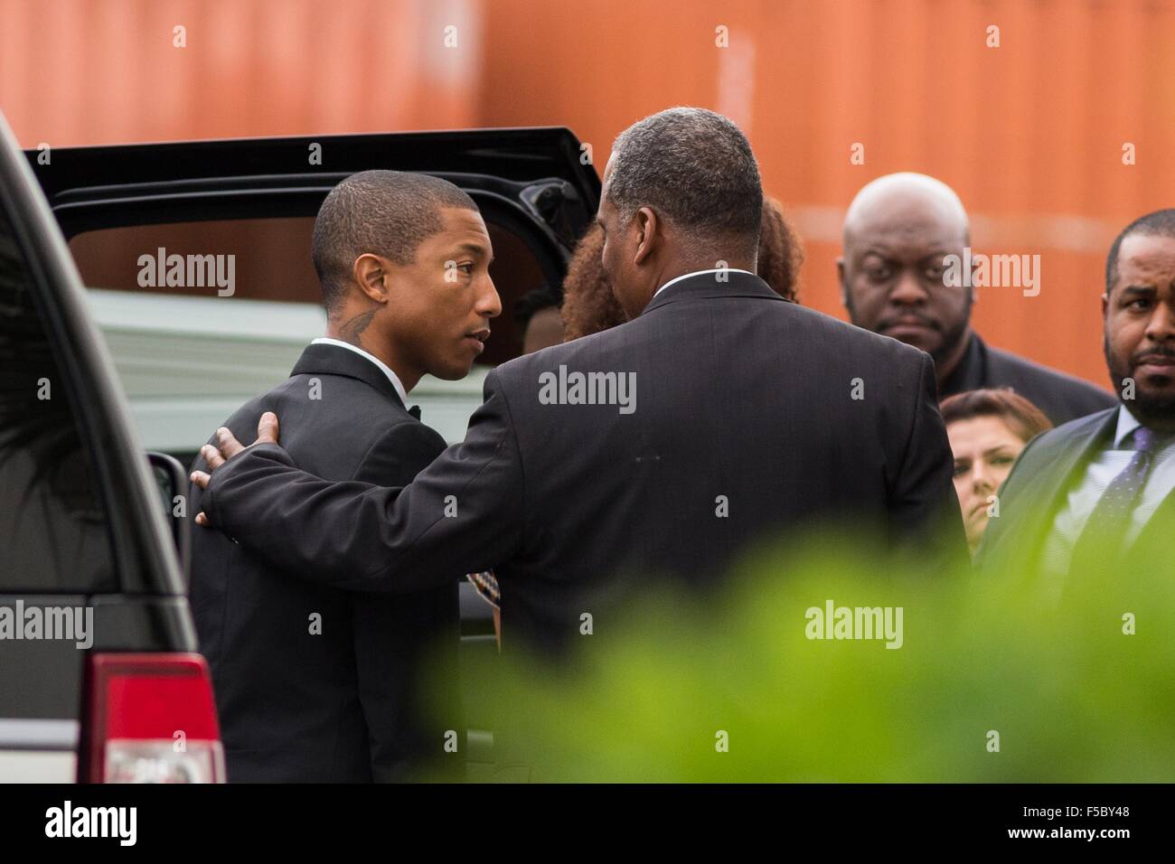 Superstar Pharrell Williams thanks family members of the Charleston 9 shooting outside the historic Mother Emanuel AME Church after performing with the Gospel Choir during Sunday service November 1, 2015 in Charleston, South Carolina. The church was the site of the mass shooting that killed nine-people in June 2015 and will be featuredais part of a program on race relations being produced by A+E Networks. Stock Photo
