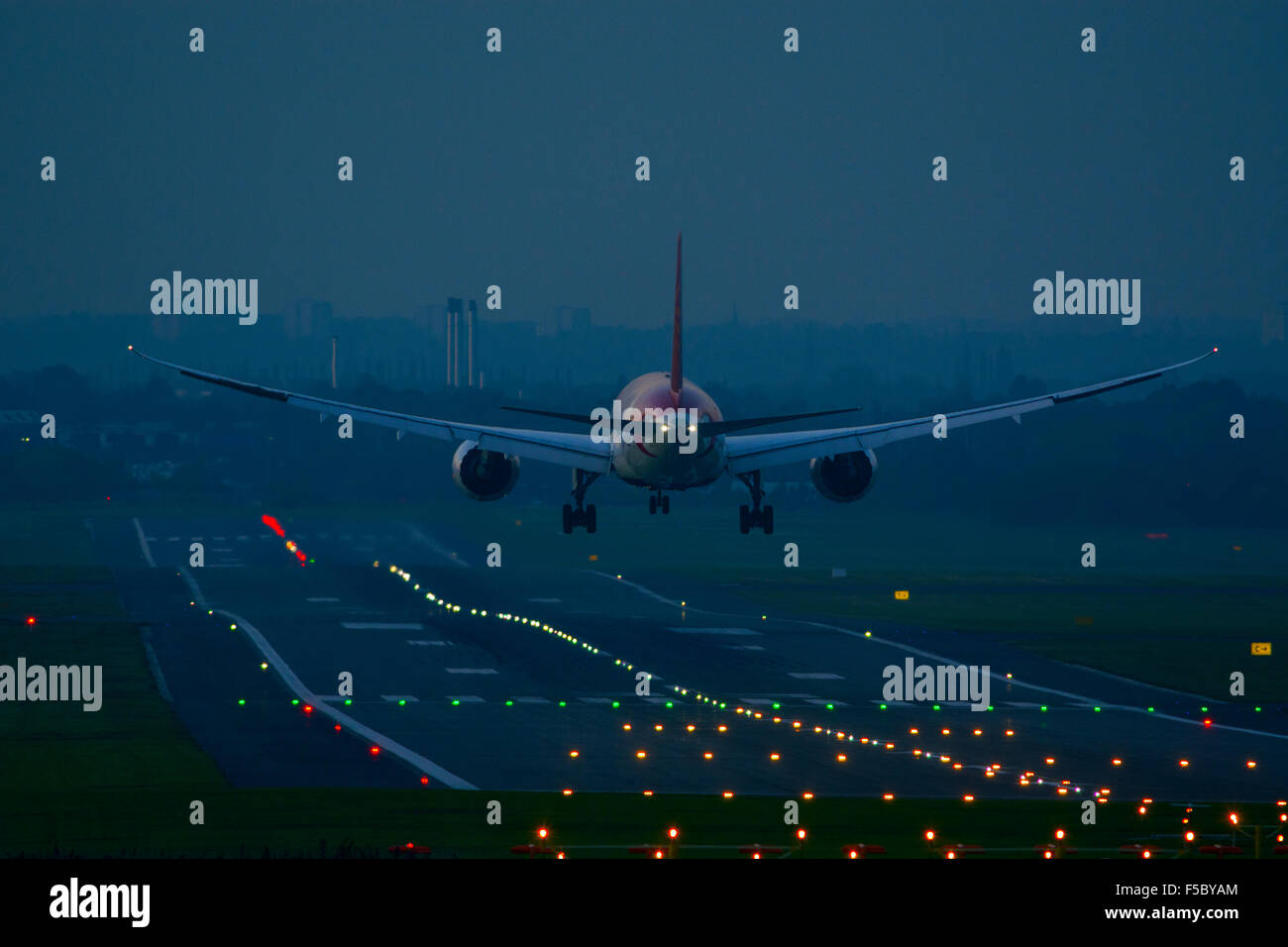 Air India Boeing 787 Dreamliner landing at dusk, Birmingham Airport. UK Stock Photo