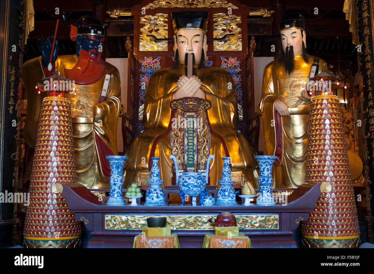 God Temple and pagoda, buddhist temple in Shanghai, altar, shrine. An altar at Chenghuang Miao or City God Temple in Yu Yuan Gar Stock Photo