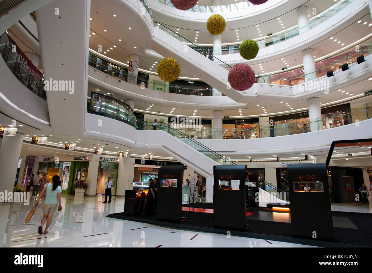 Interior of upmarket shopping mall in Lujiazui financial district of ...