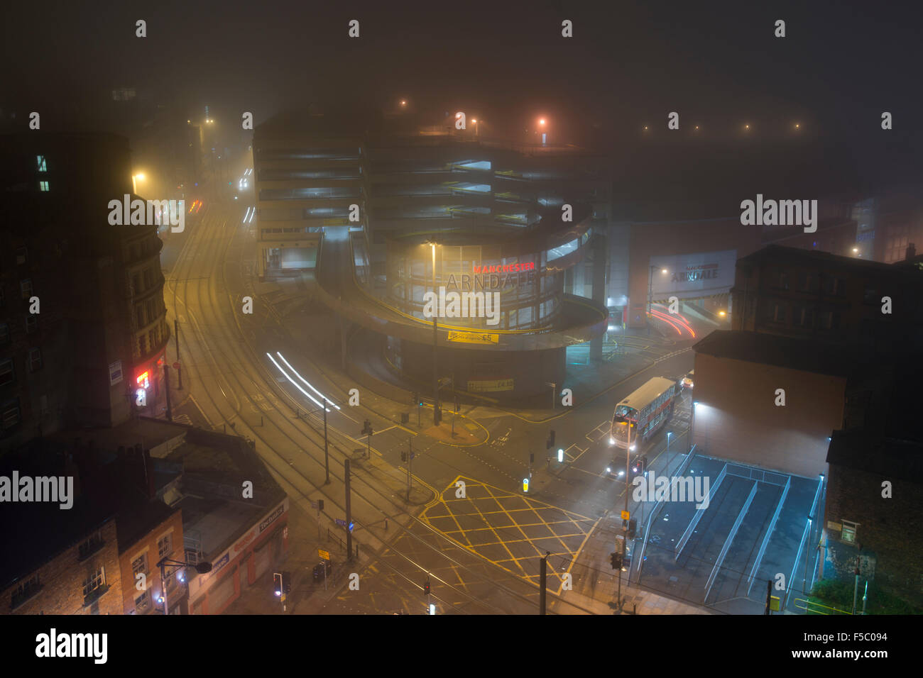 MANCHESTER, UK. 1st November 2015. A view of Shudehill, High Street and Withy Grove in the Northern Quarter area of Manchester as dense fog descends on the city centre during the late evening Credit:  Russell Hart/Alamy Live News. Stock Photo