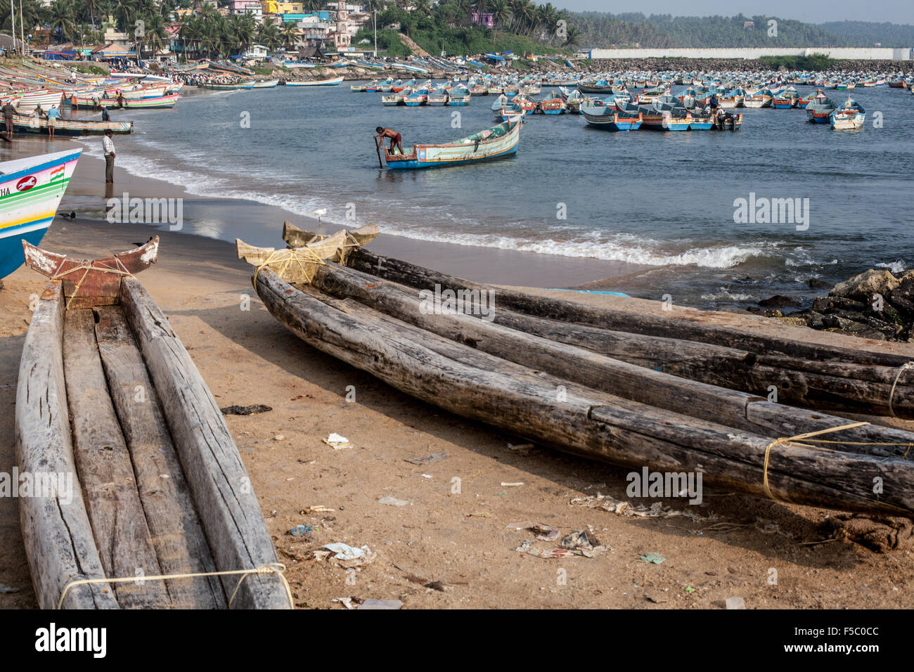 Vizhinjam Christian fisherman village in Kerala, India, November 2014. There are hundreds of boats on the beach. Stock Photo