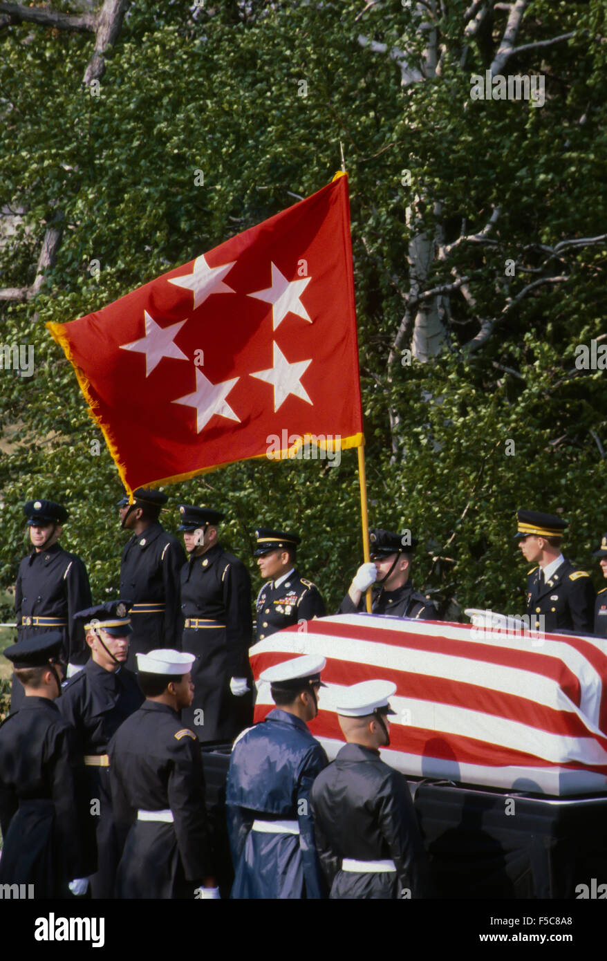 Arlington, Virginia.  4-14-1981  Funeral services for General of the Army Omar Bradley. The General's casket is carried by the funeral detail to the grave site. The General's 5 star  flag donating his rank as a General of the Army  is held over the casket for the final time.  Credit: Mark Reinstein Stock Photo