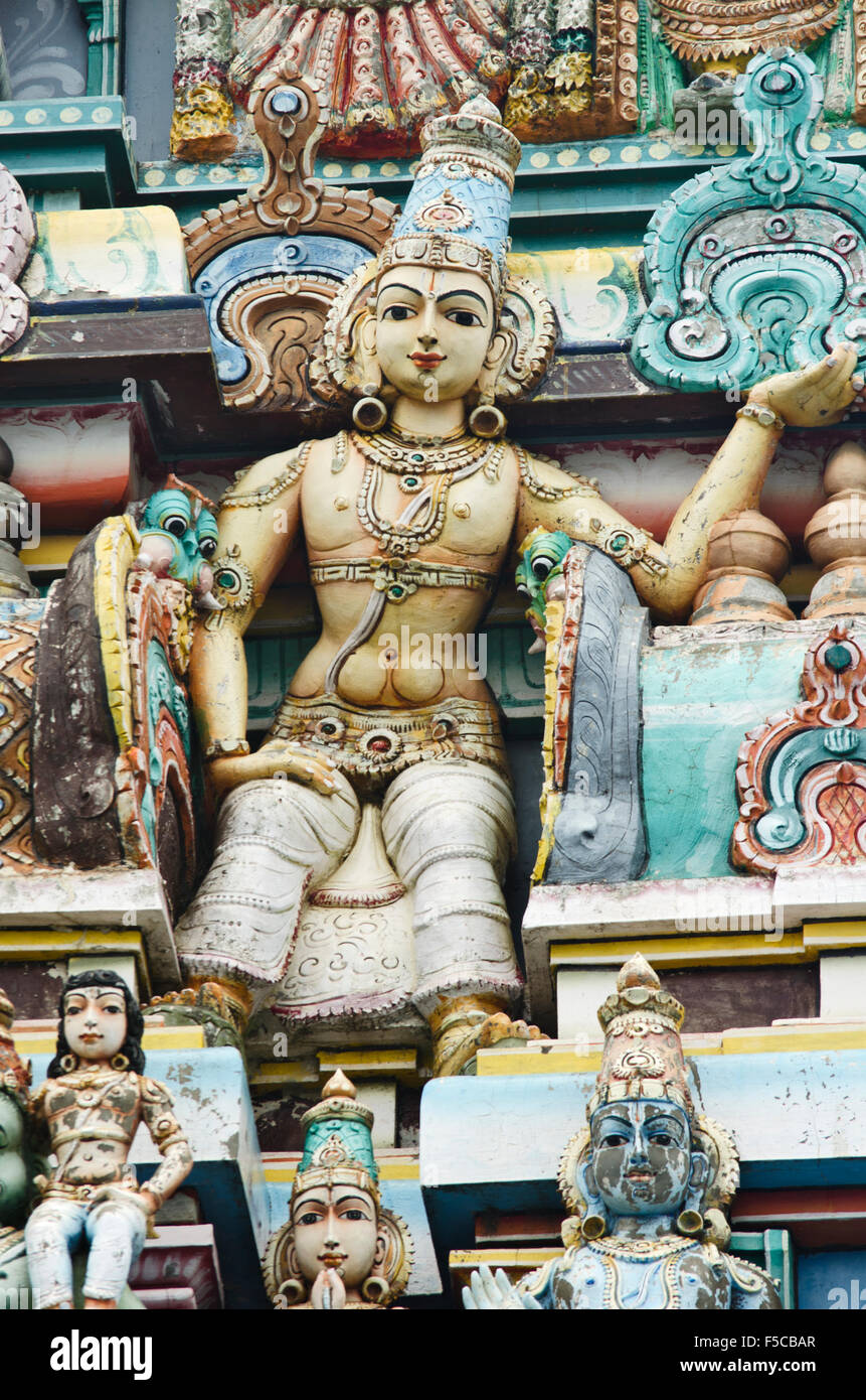 Intricate carvings of Hindu Gods and Goddesses on the facade of a Hindu temple in Chennai