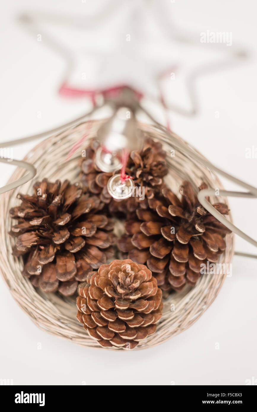 Christmas decorative basket pine cones hi-res stock photography and ...