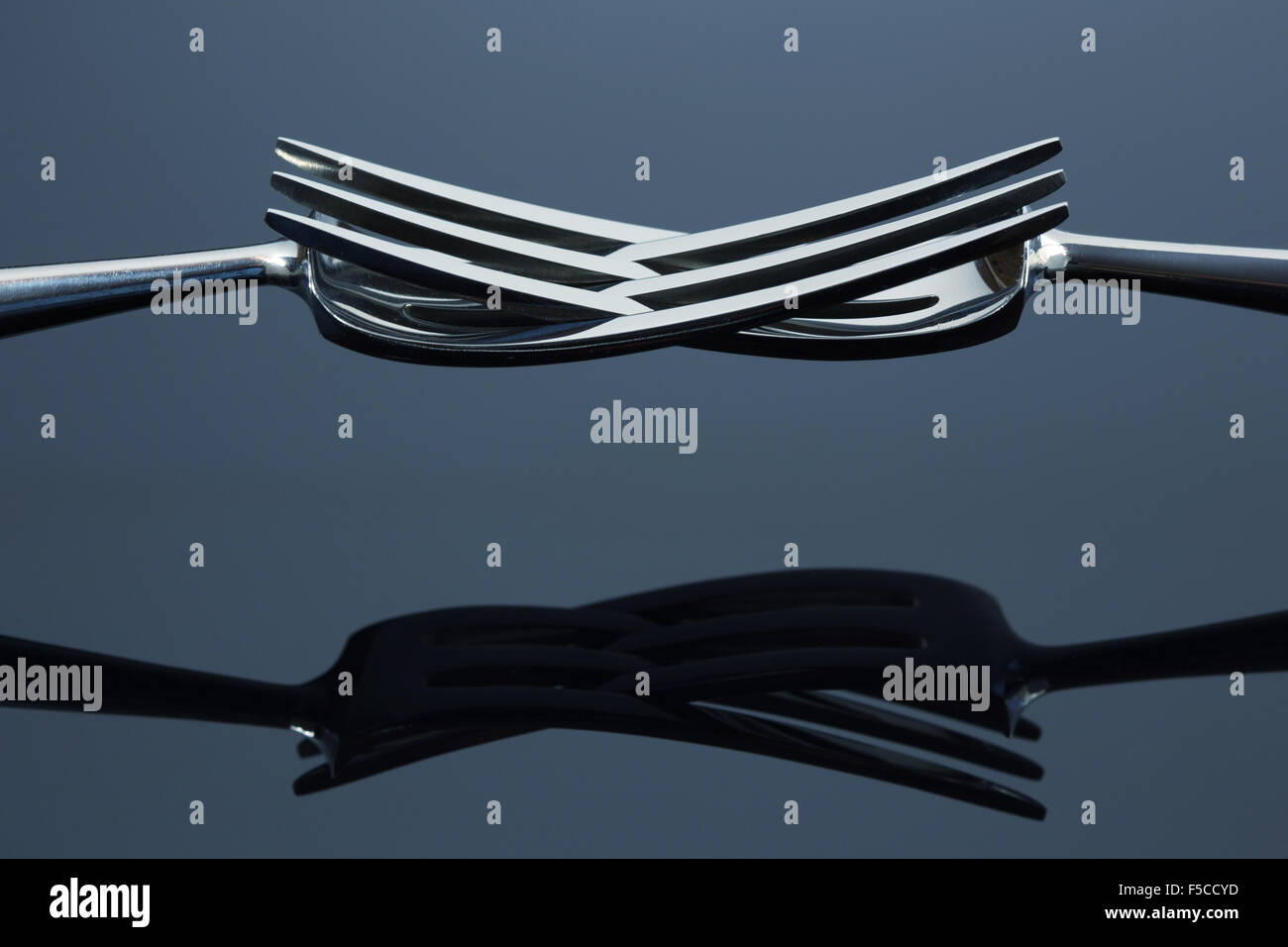 Gold forks hi-res stock photography and images - Alamy