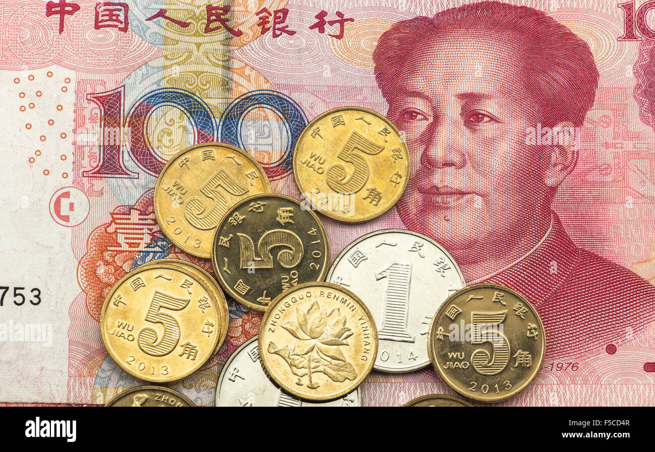 Chinese renminbi 100 bank note and coins Stock Photo Alamy