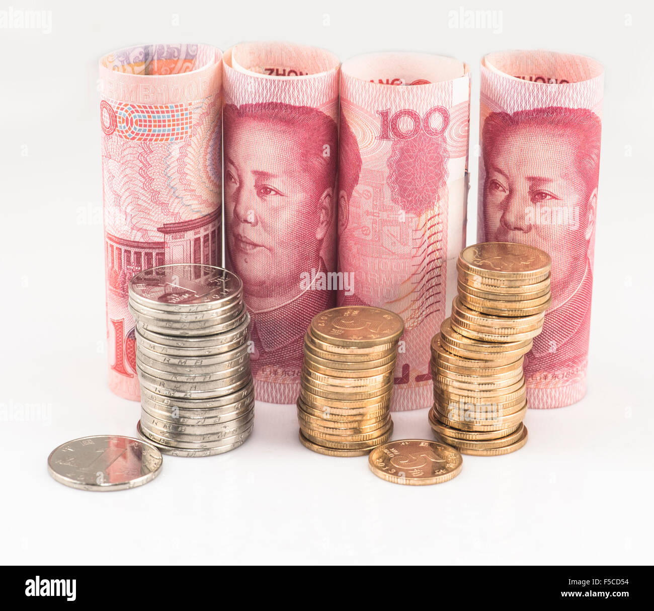 Chinese renminbi 100 bank note and coins Stock Photo