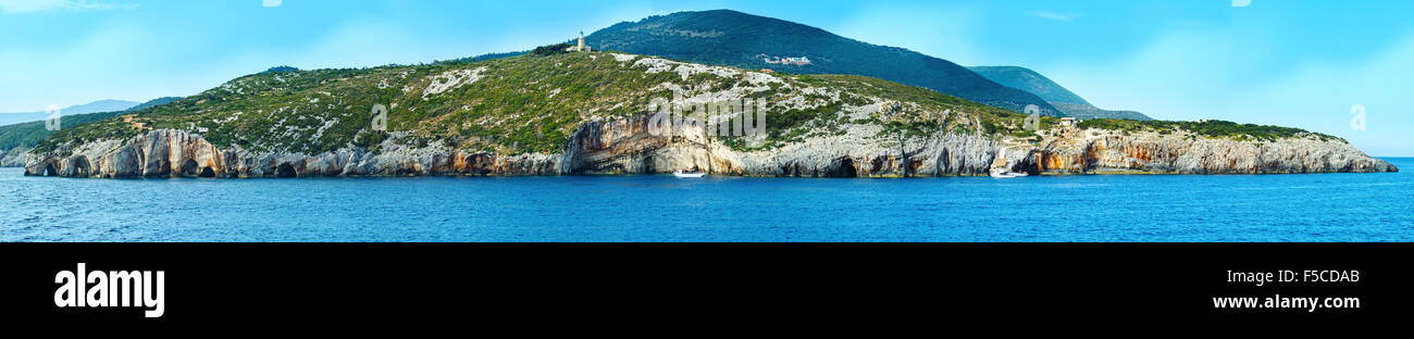 View of Blue Caves from ferry (Zakynthos, Greece, Cape Skinari). Panorama. Stock Photo