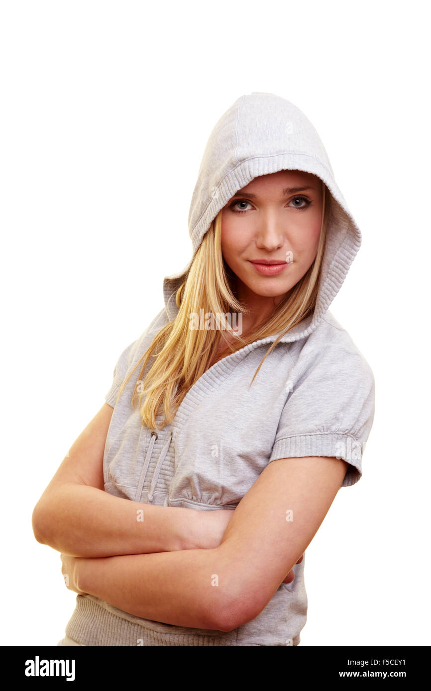 Young blonde woman carrying a gray hoody Stock Photo