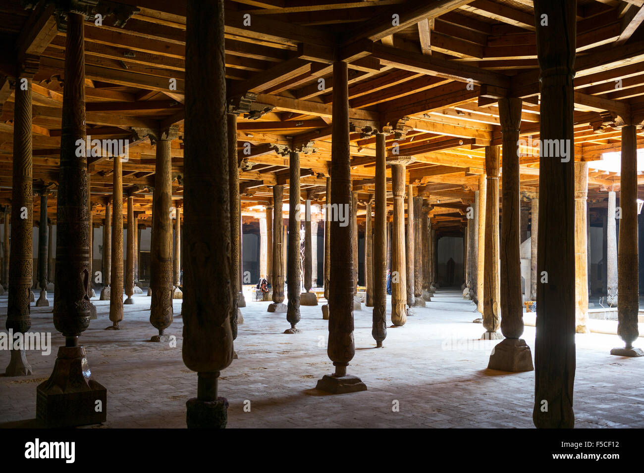 Uzbekistan, Khiva, the wood columns of the old Juma mosque inside Stock Photo