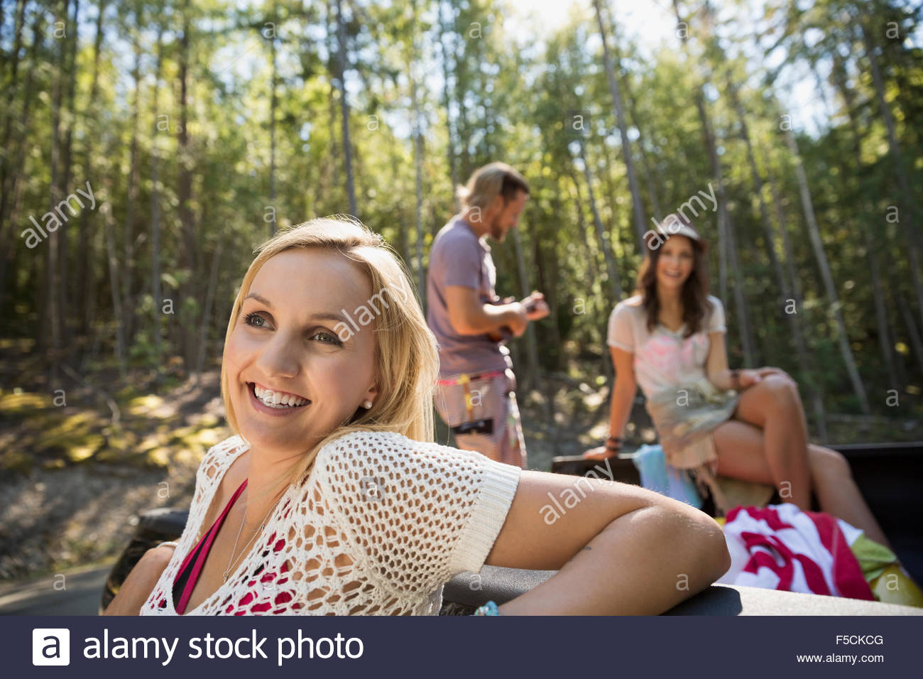 Smiling young friends hanging out Stock Photo