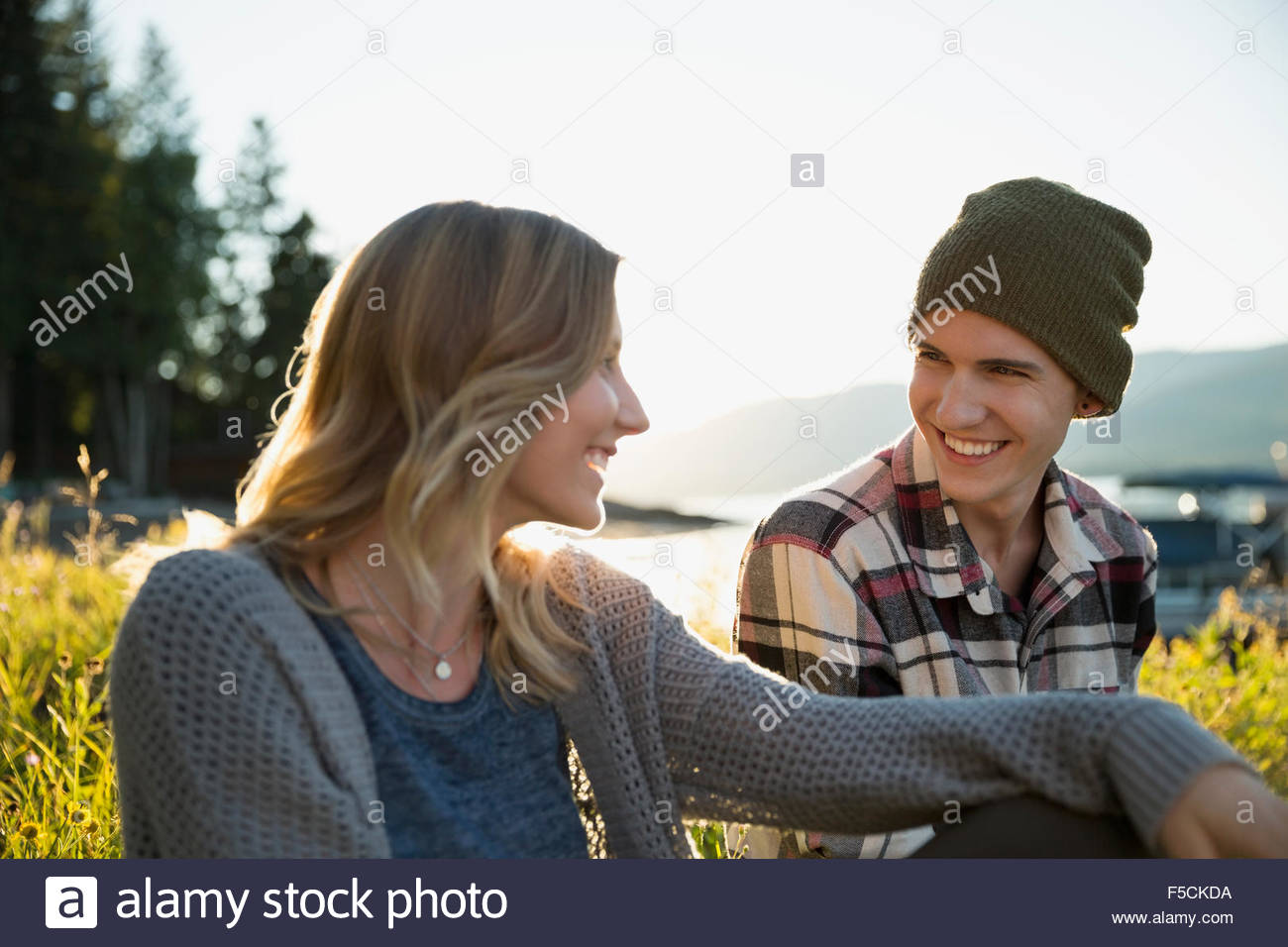 Young couple talking outdoors Stock Photo
