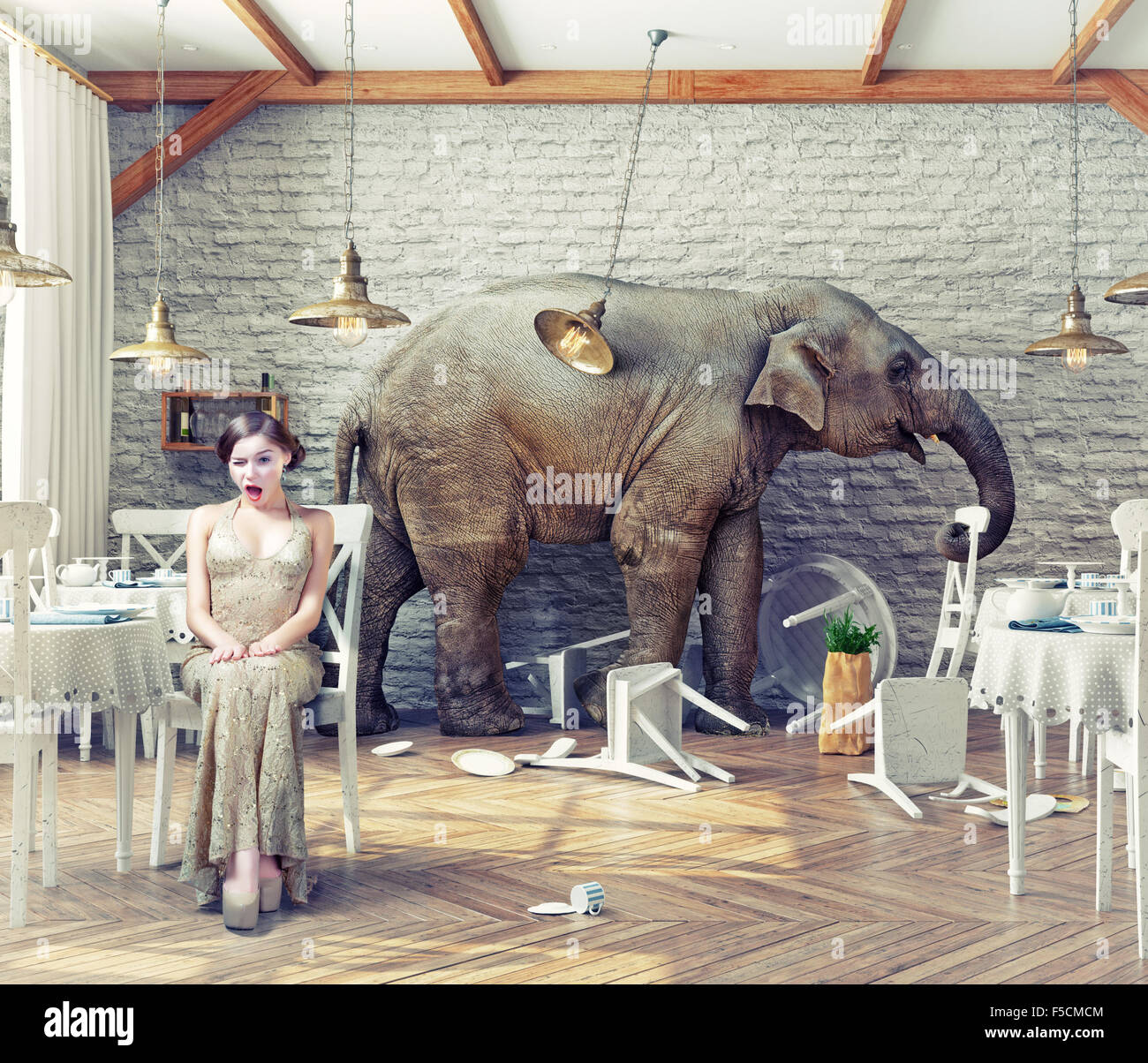 the elephant calm in a restaurant interior. photo combination concept Stock Photo